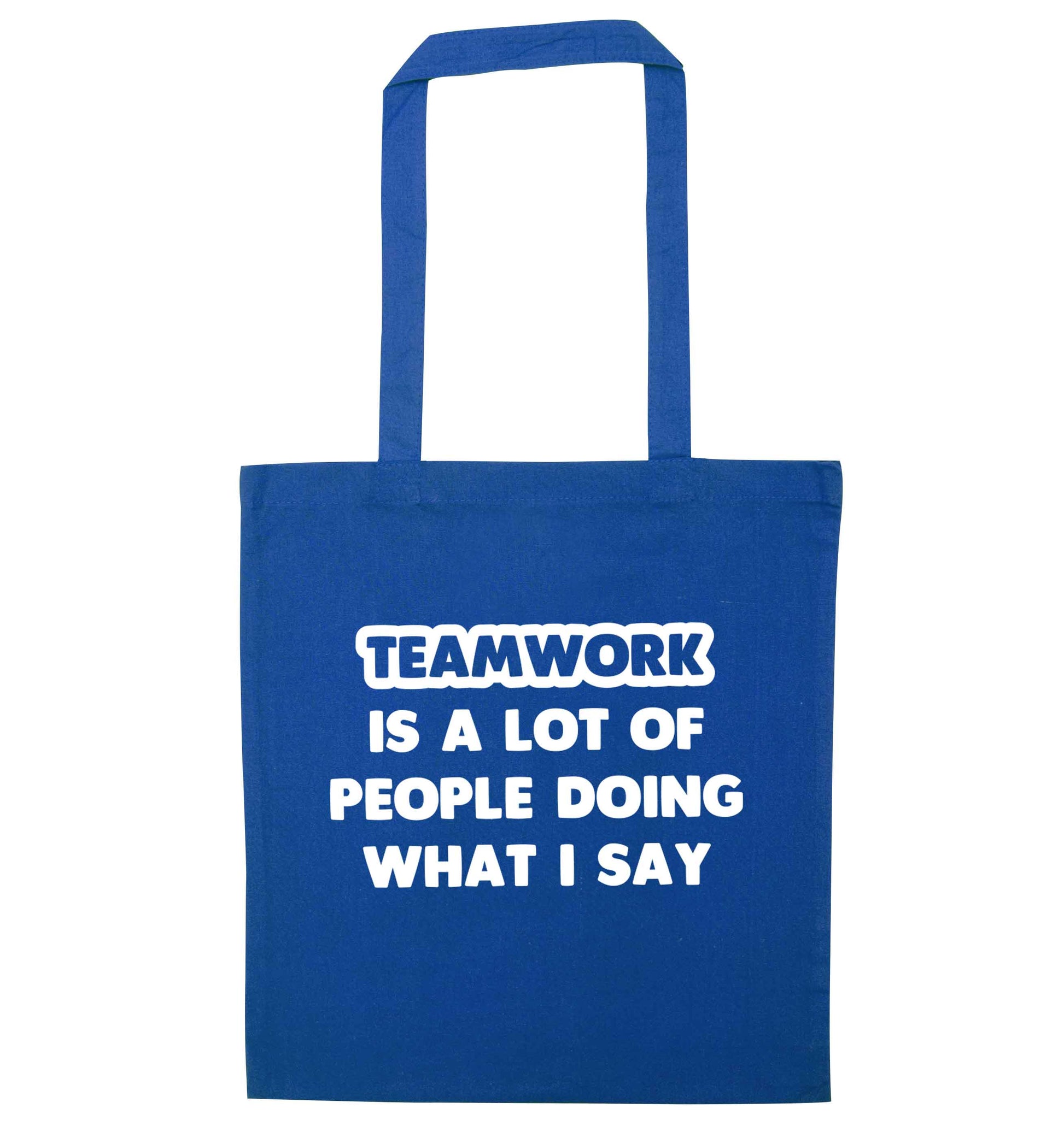 Teamwork is a lot of people doing what I say blue tote bag