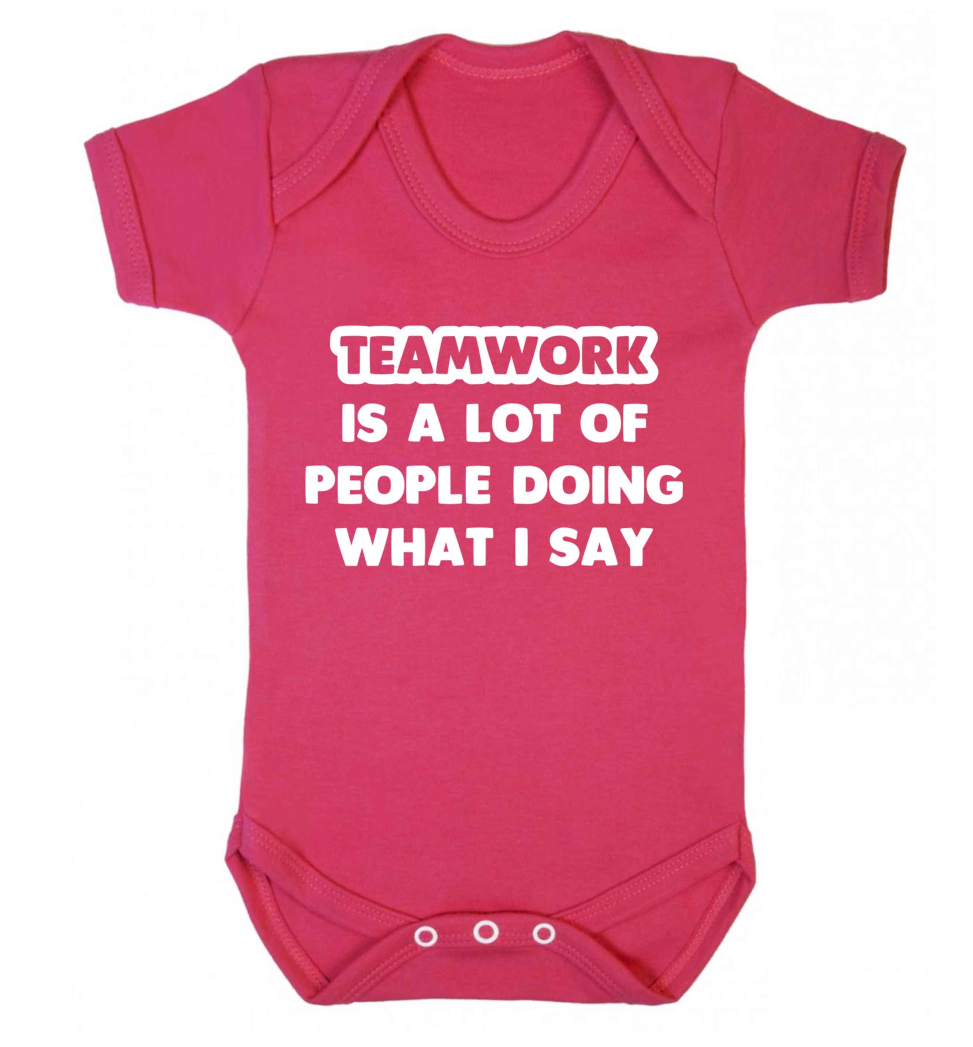 Teamwork is a lot of people doing what I say Baby Vest dark pink 18-24 months