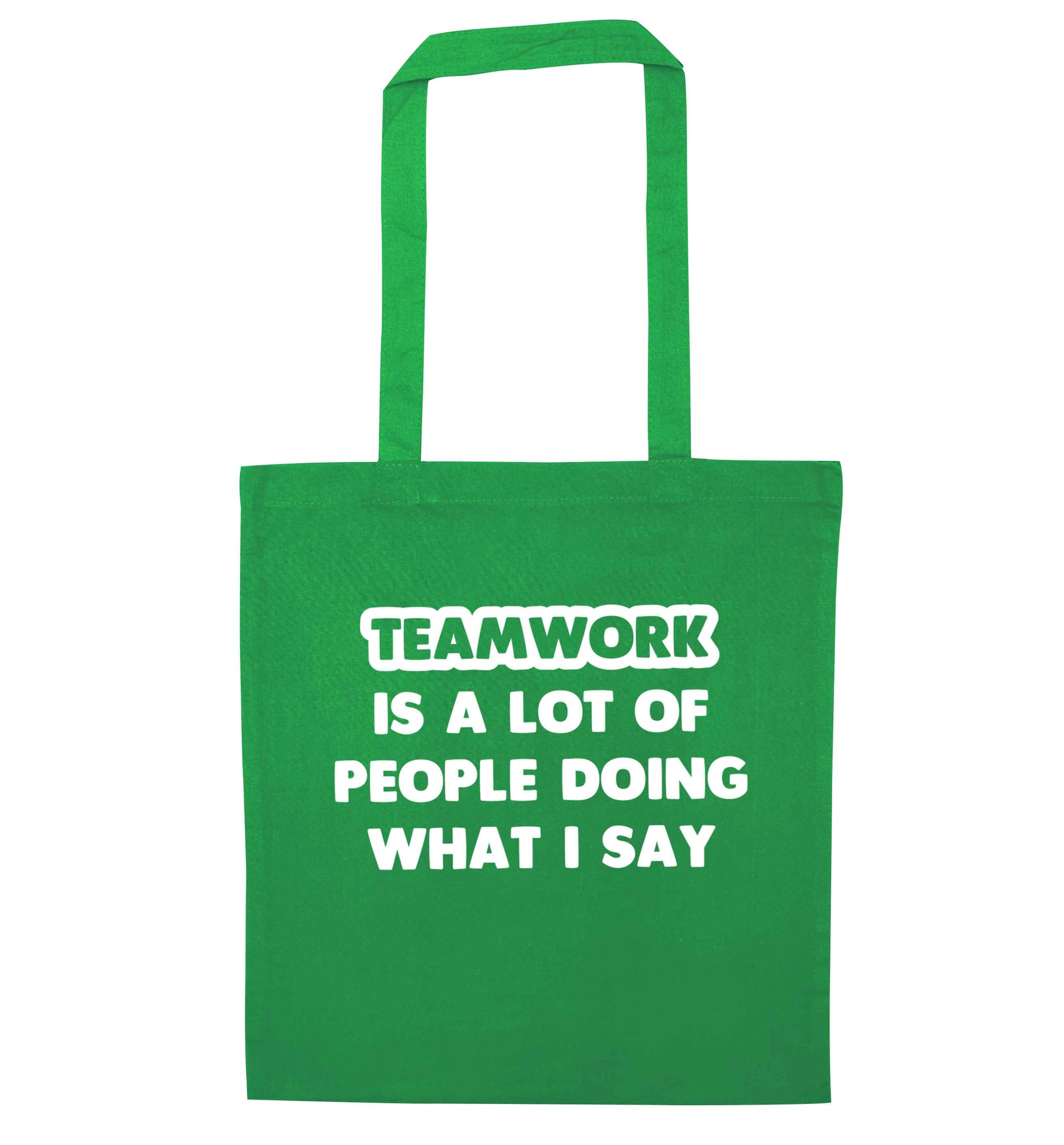 Teamwork is a lot of people doing what I say green tote bag