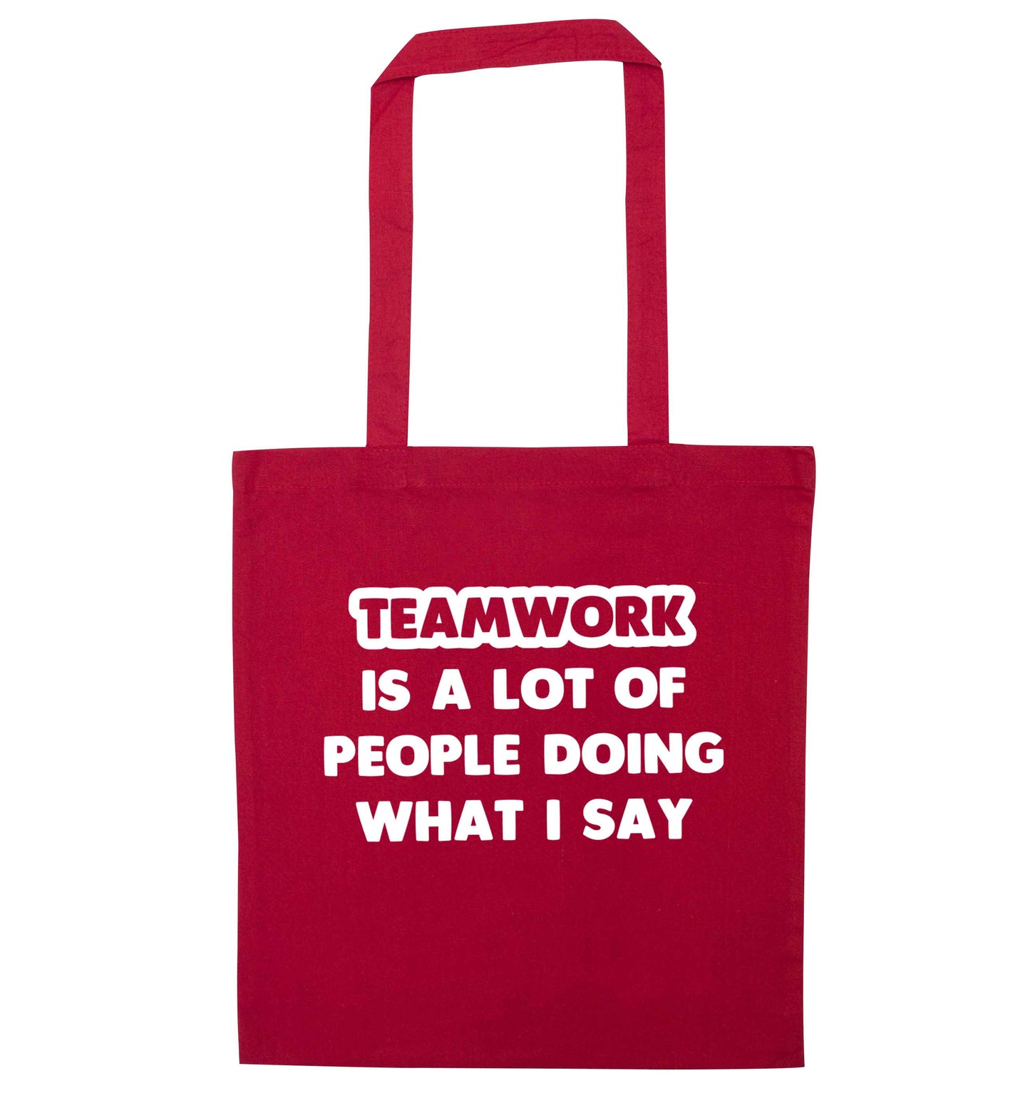 Teamwork is a lot of people doing what I say red tote bag