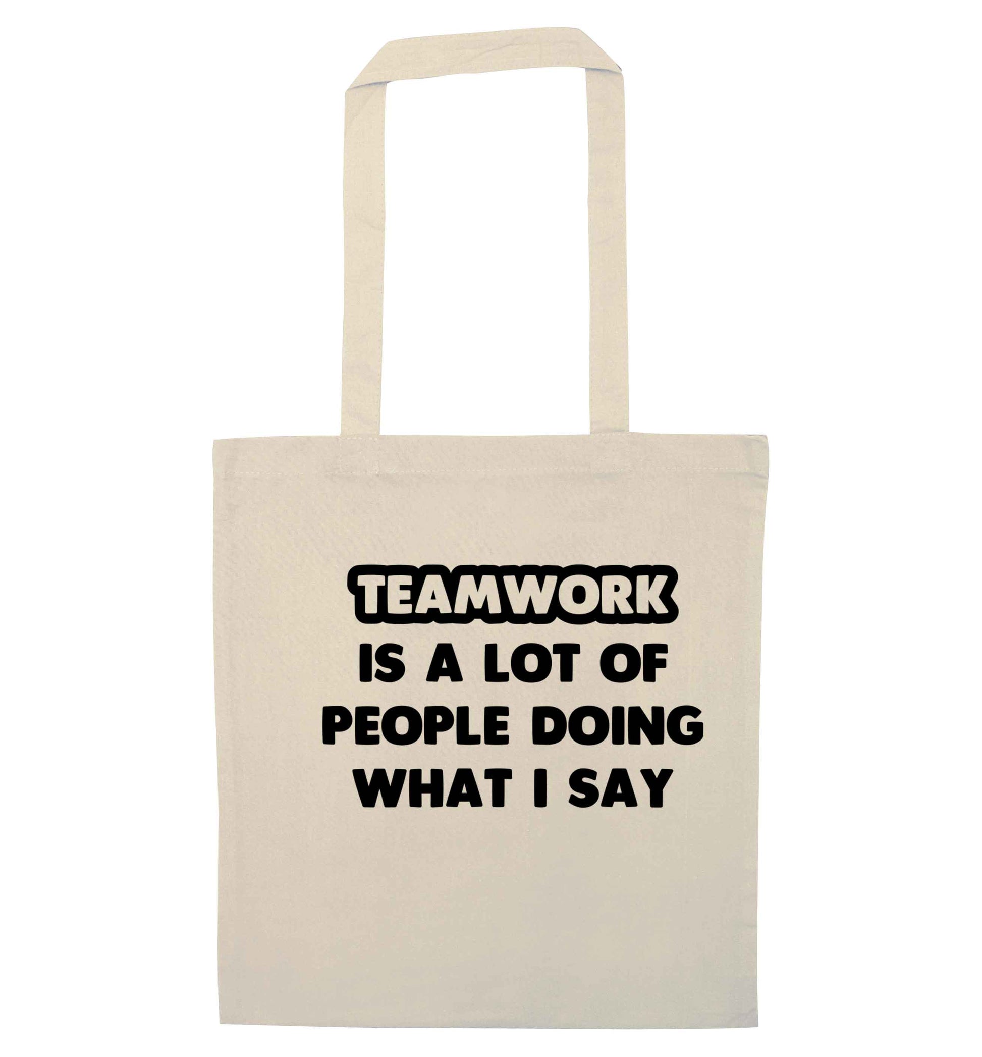 Teamwork is a lot of people doing what I say natural tote bag