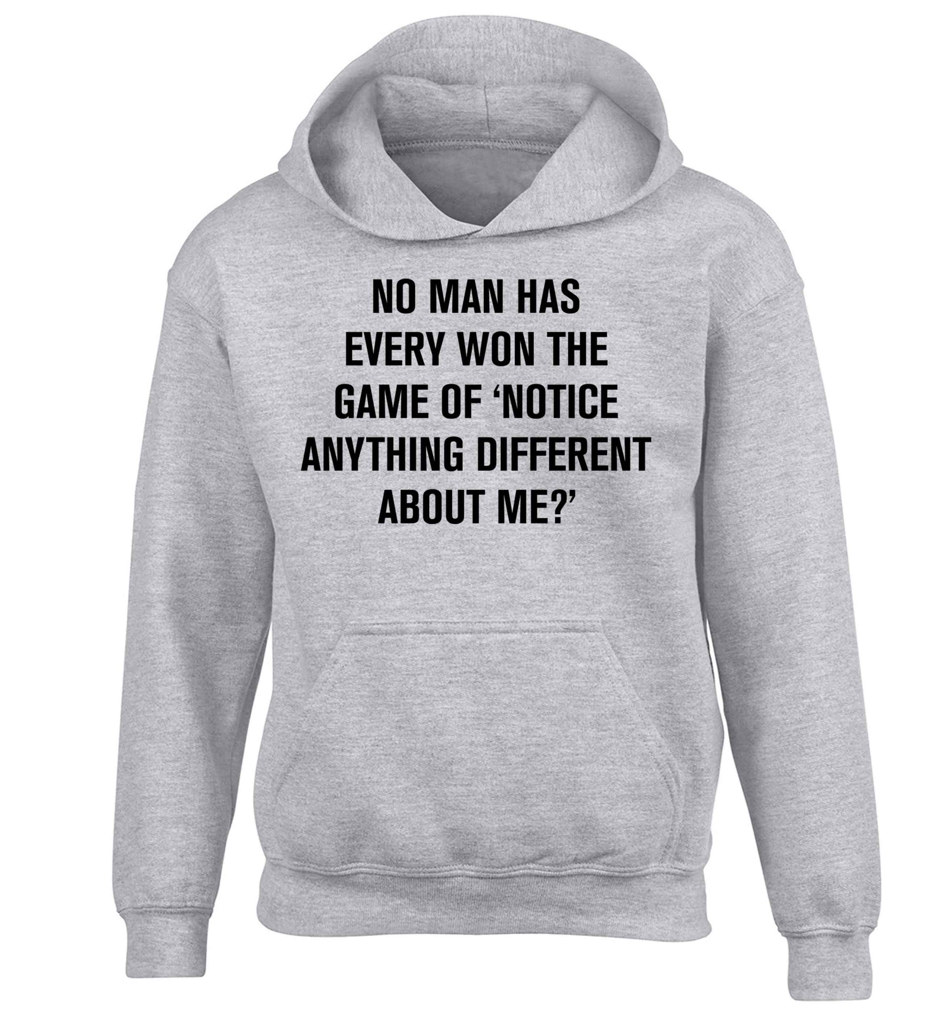 No man has ever won the game of 'notice anything different about me?' children's grey hoodie 12-13 Years