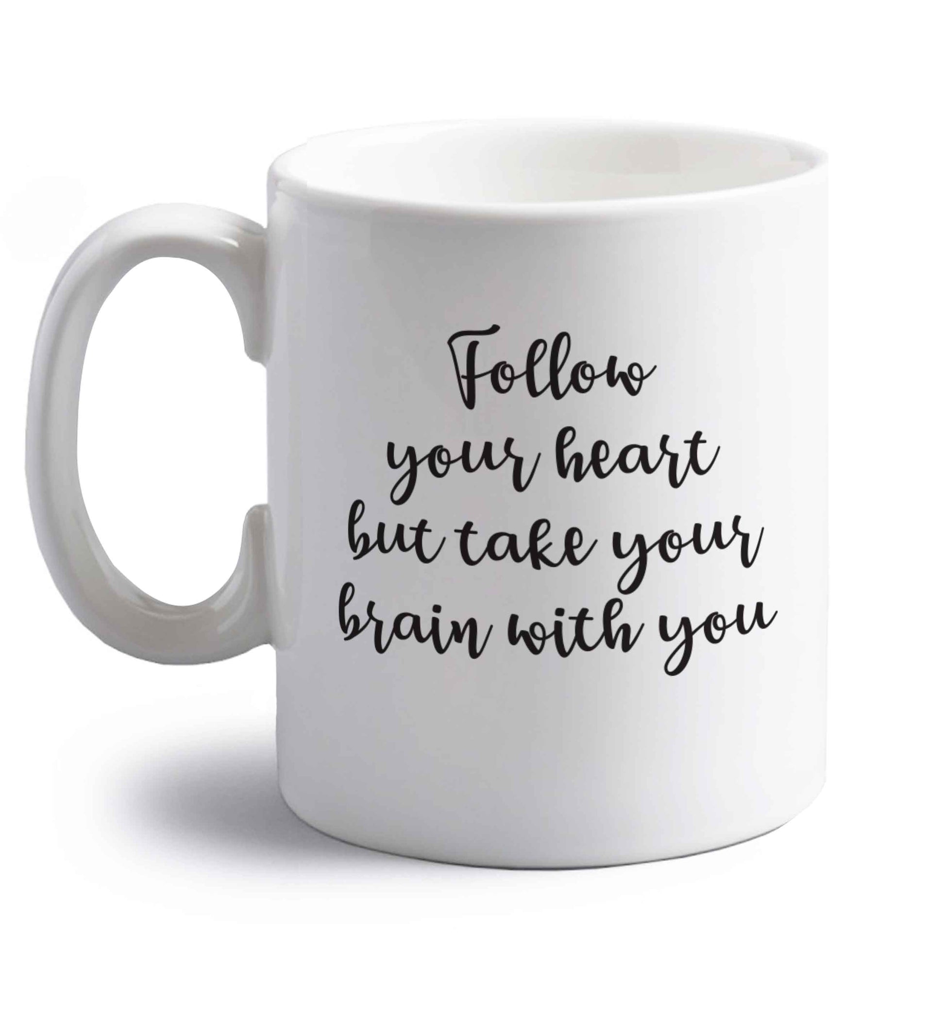 Follow your heart but take your head with you right handed white ceramic mug 