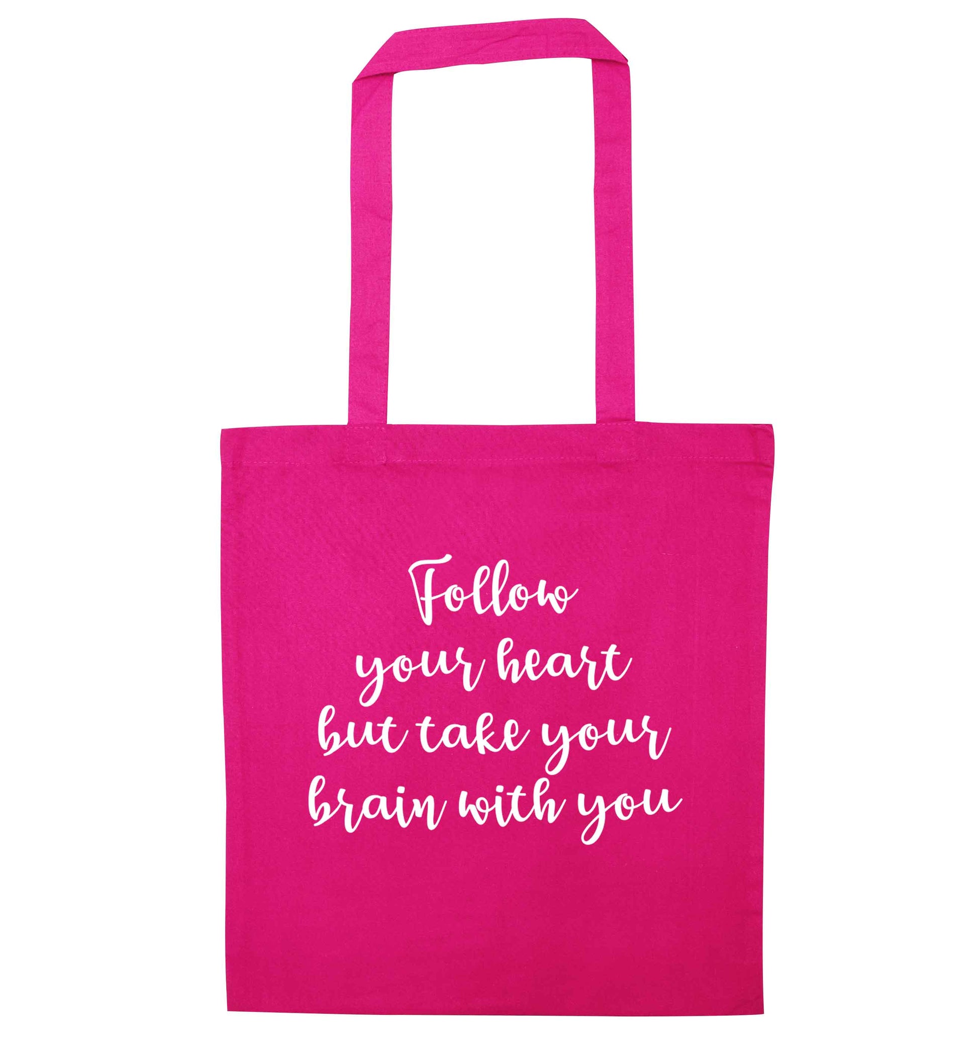 Follow your heart but take your head with you pink tote bag