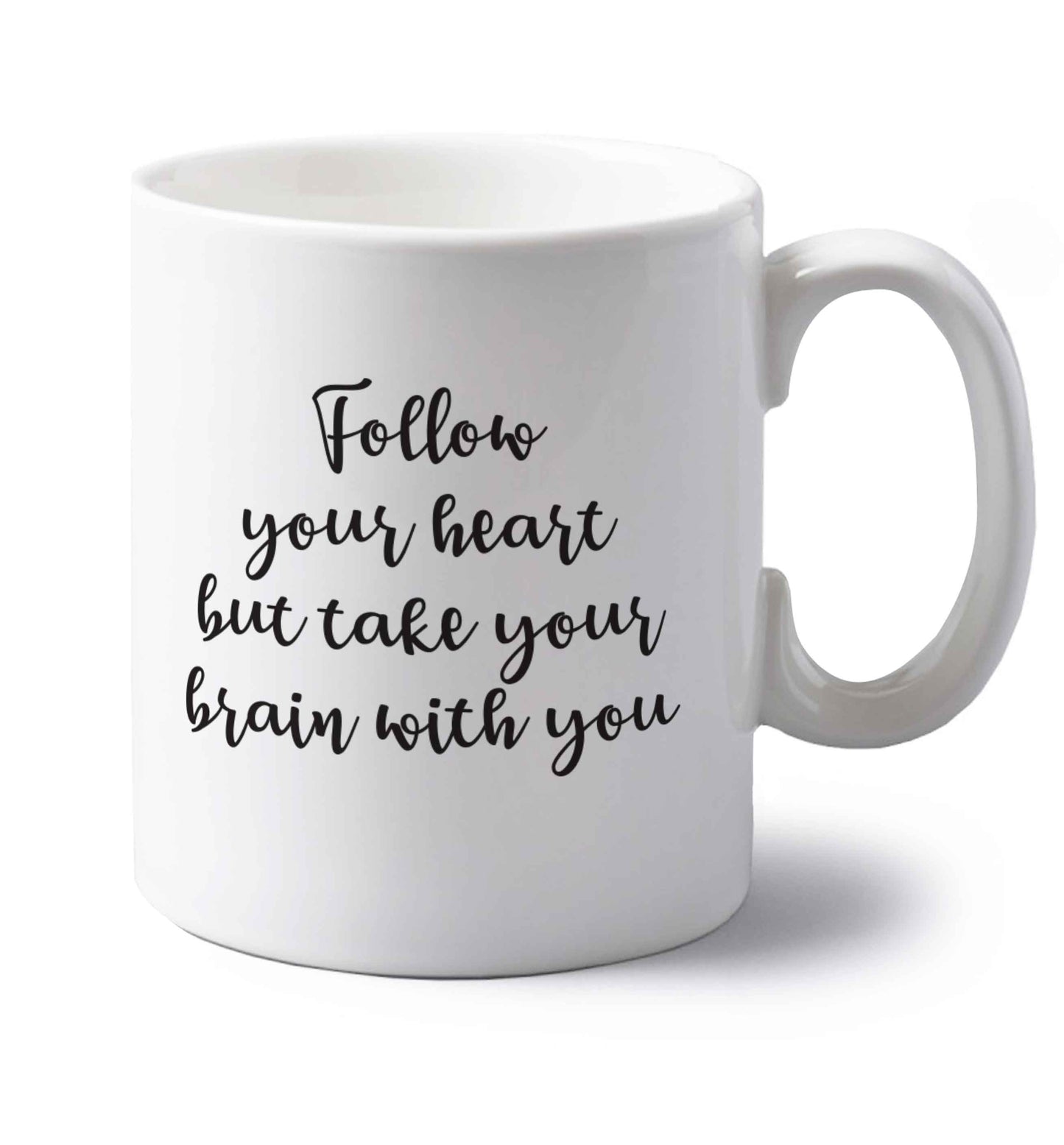 Follow your heart but take your head with you left handed white ceramic mug 