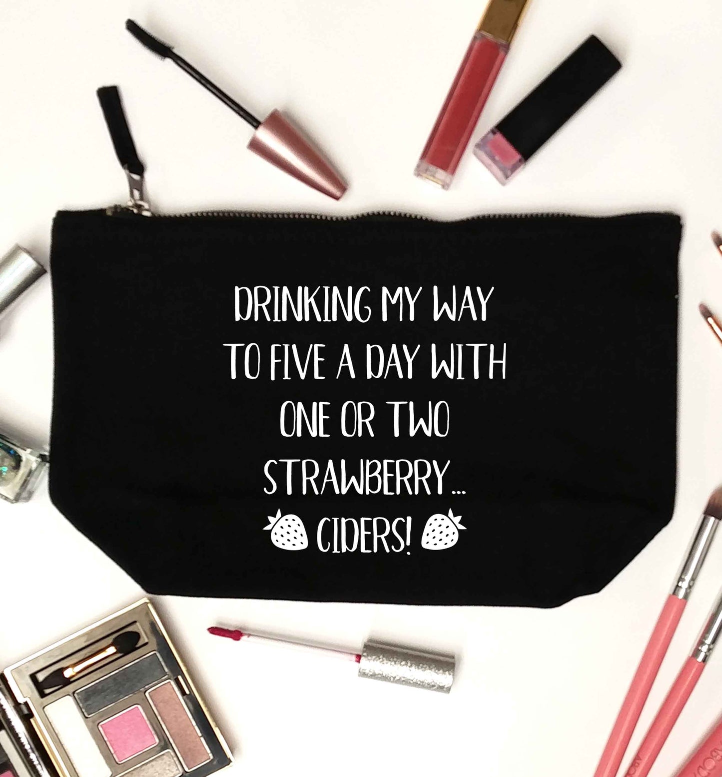 Drinking my way to five a day with one or two strawberry ciders black makeup bag