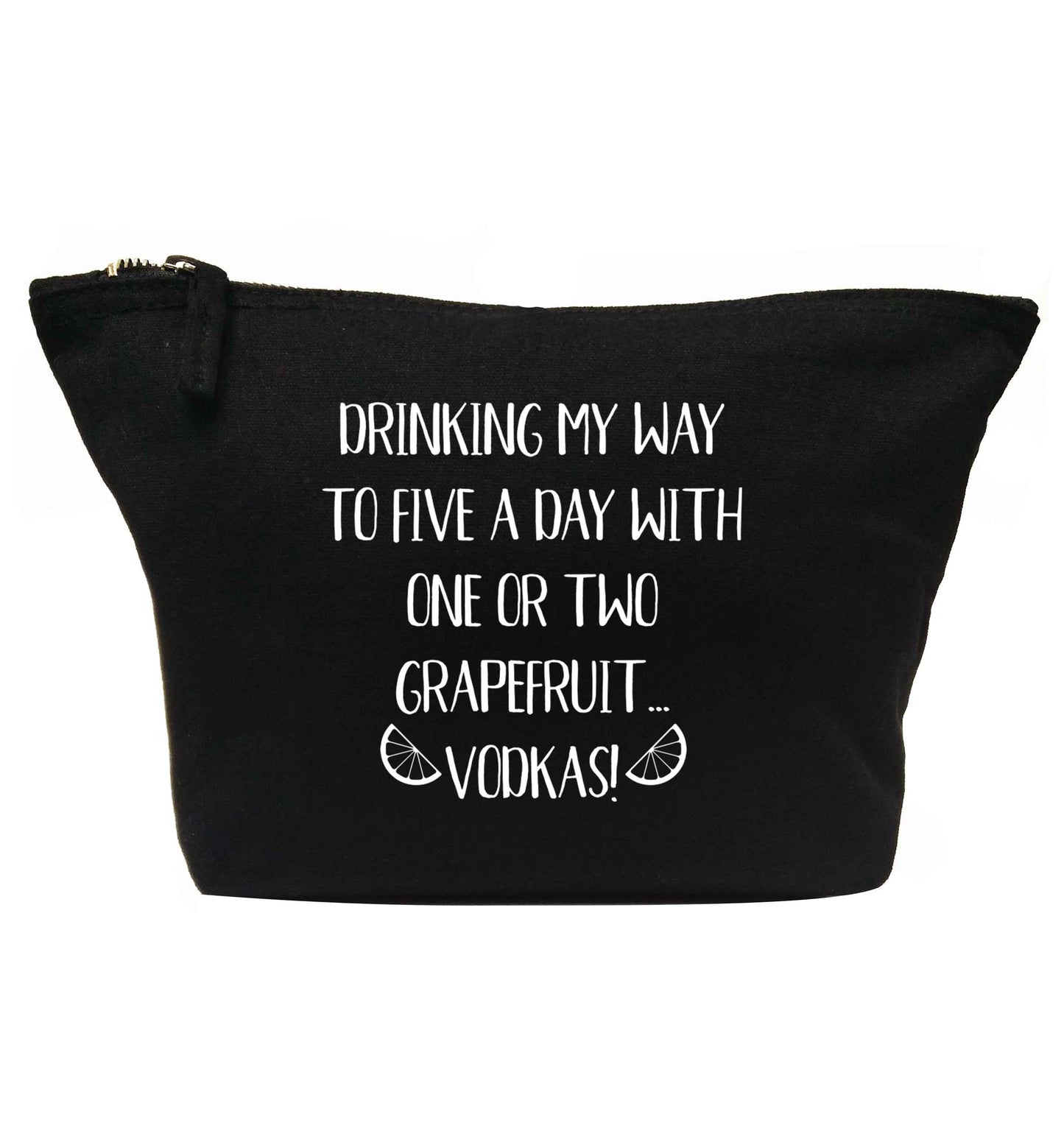 Drinking my way to five a day with one or two grapefruit vodkas | makeup / wash bag