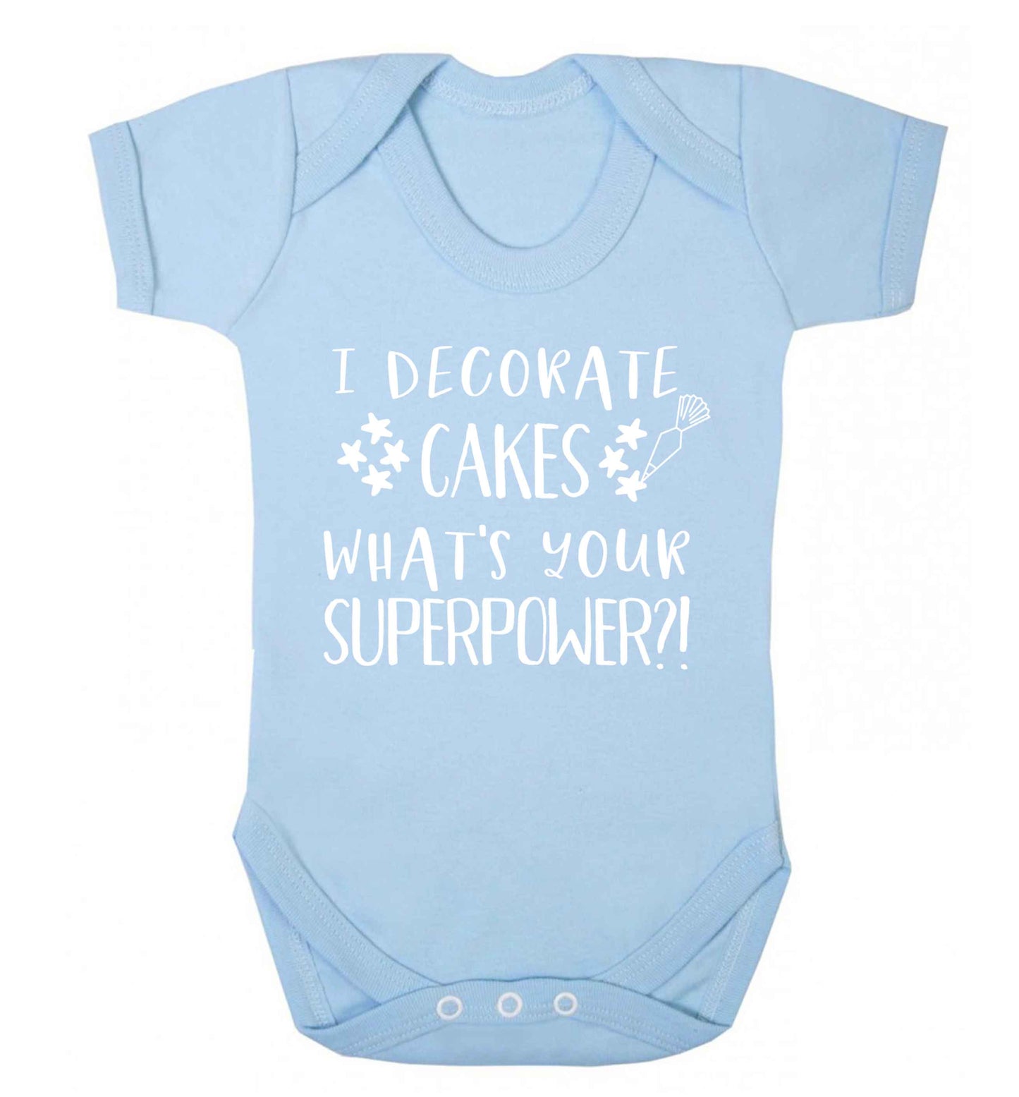 I decorate cakes what's your superpower?! Baby Vest pale blue 18-24 months