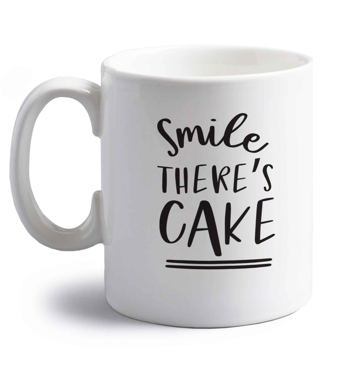 Smile there's cake right handed white ceramic mug 