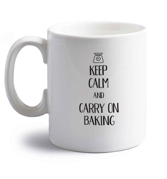Keep calm and carry on baking right handed white ceramic mug 