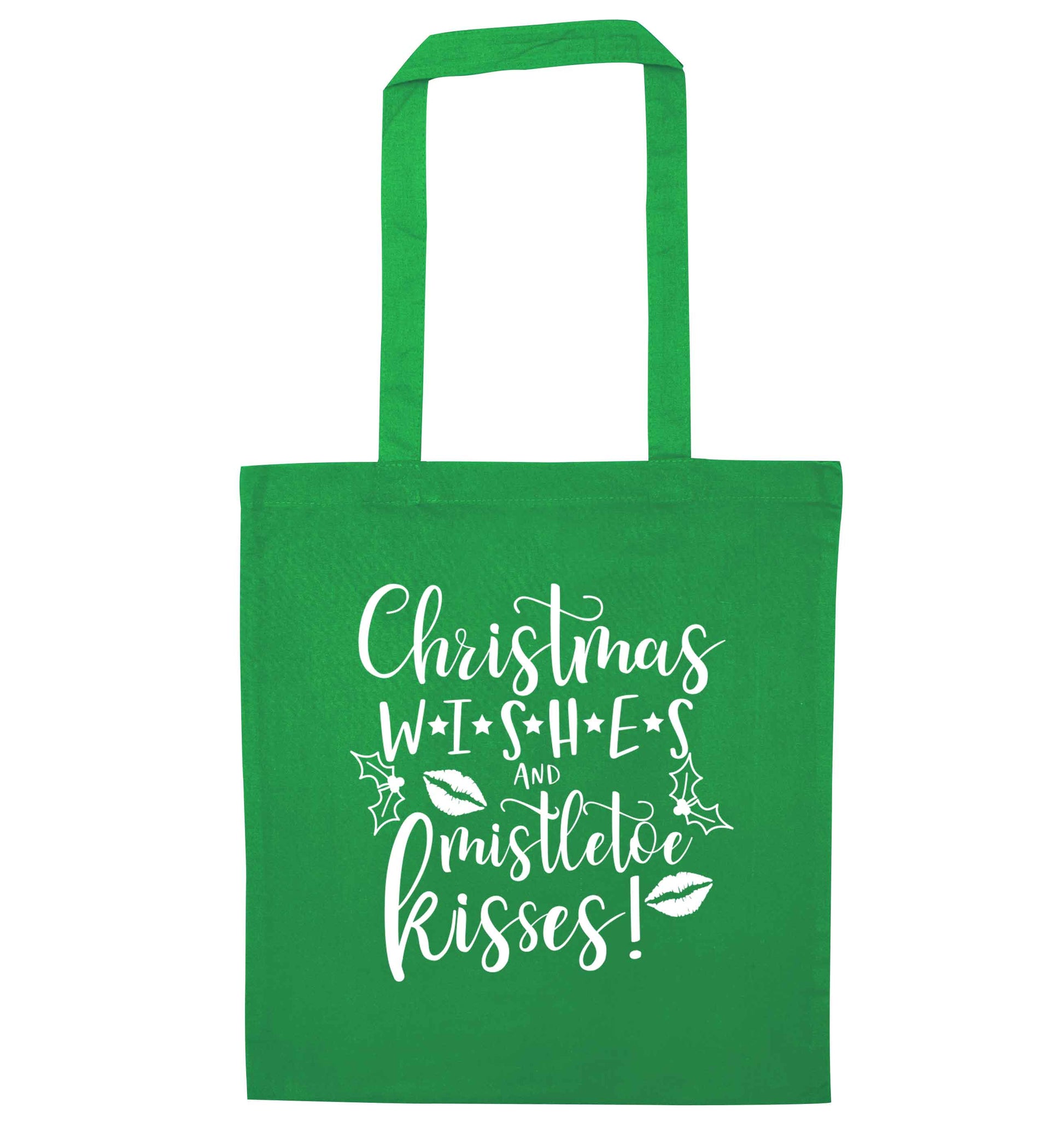 Christmas wishes and mistletoe kisses green tote bag
