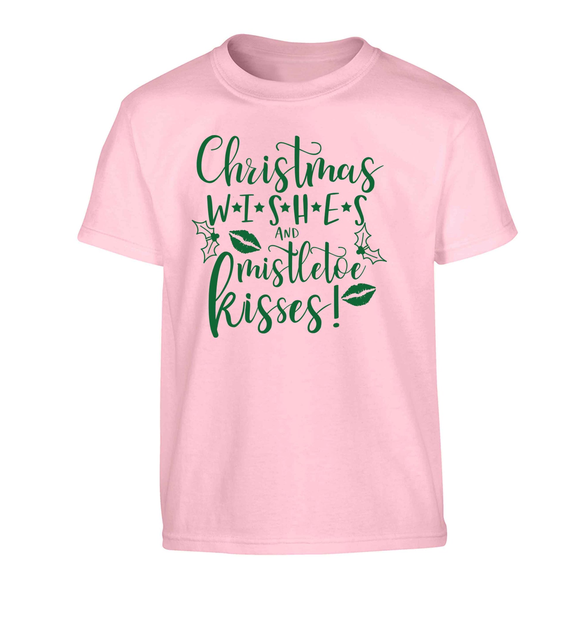 Christmas wishes and mistletoe kisses Children's light pink Tshirt 12-13 Years