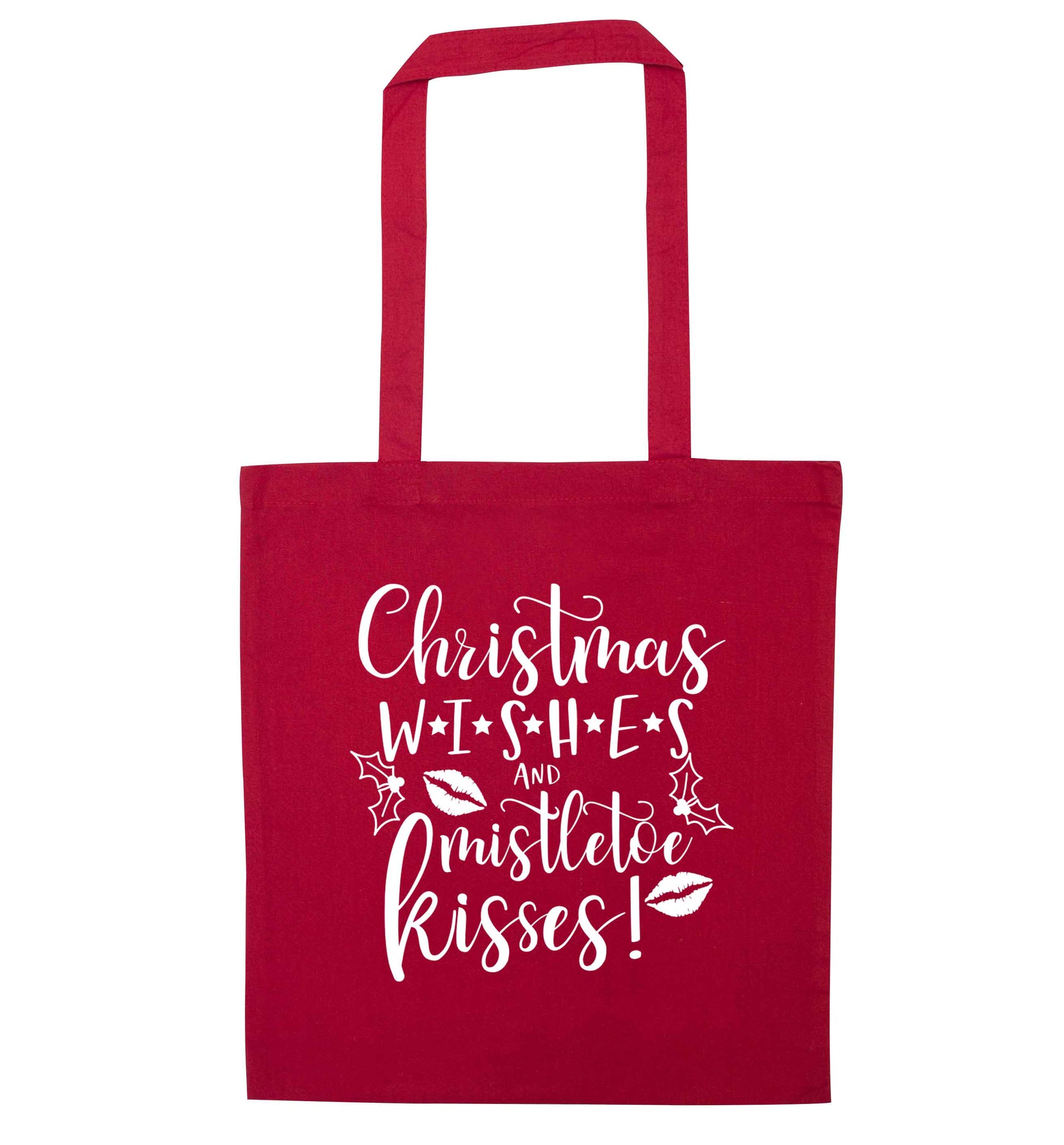 Christmas wishes and mistletoe kisses red tote bag