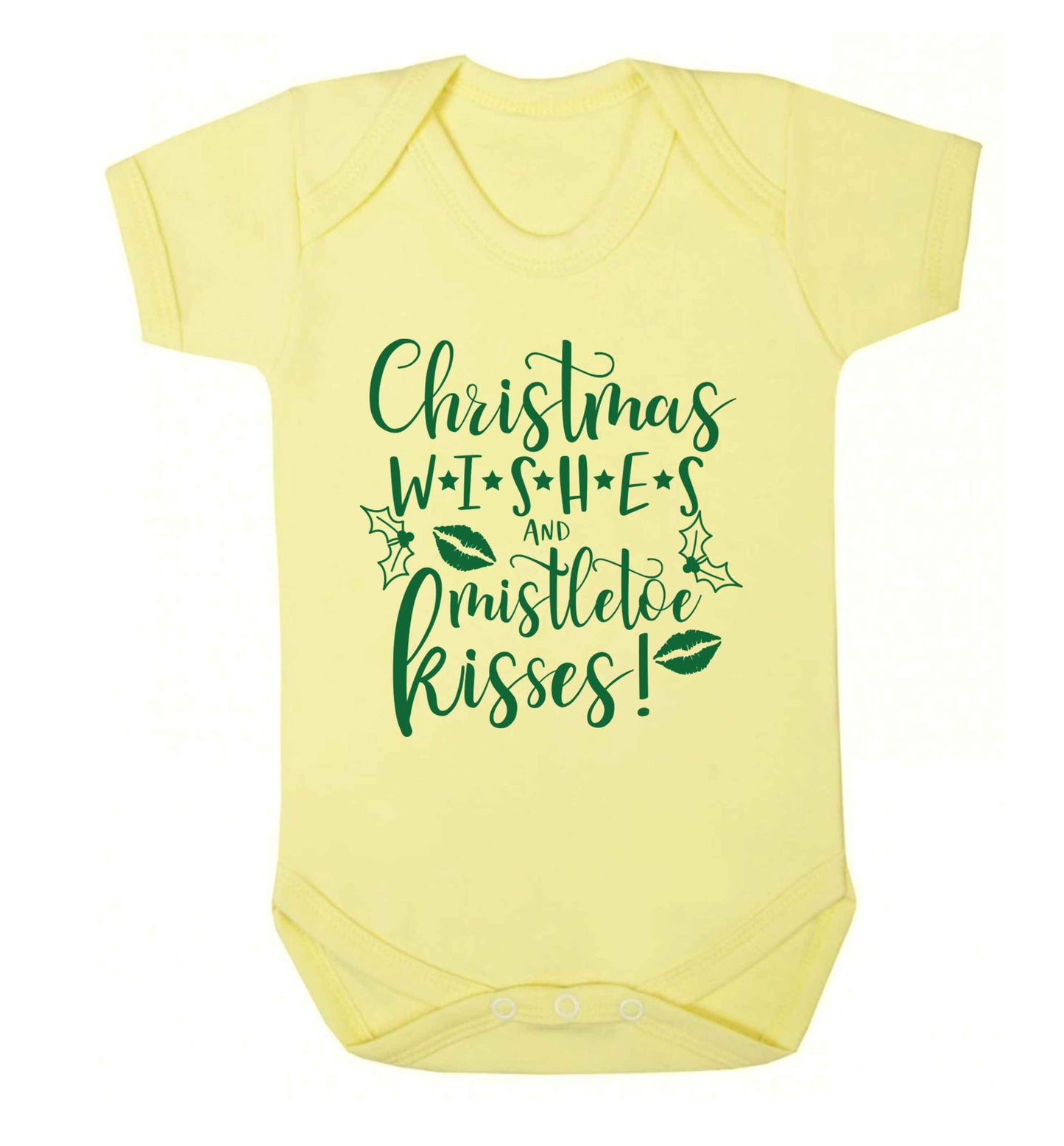 Christmas wishes and mistletoe kisses Baby Vest pale yellow 18-24 months