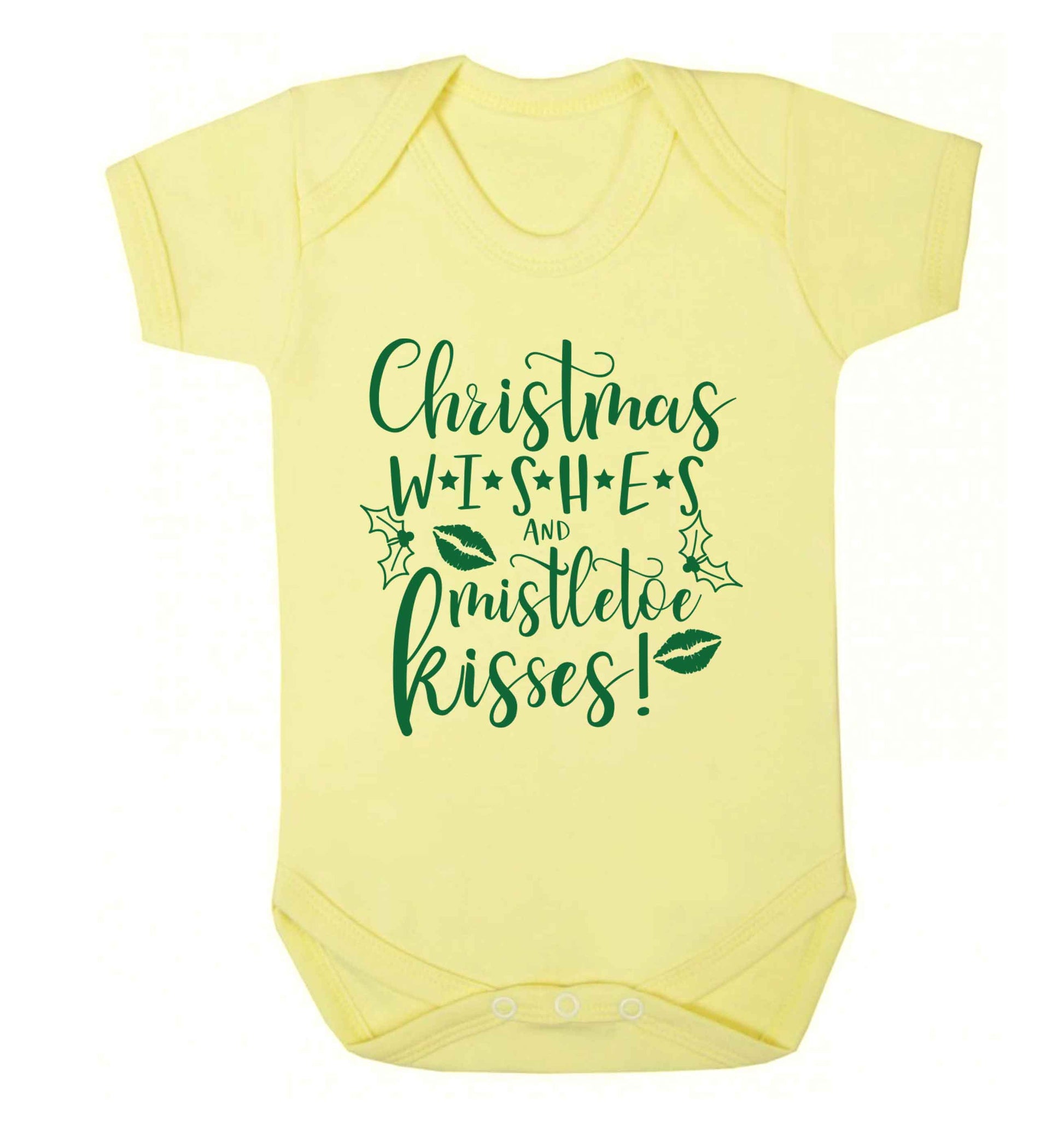 Christmas wishes and mistletoe kisses Baby Vest pale yellow 18-24 months
