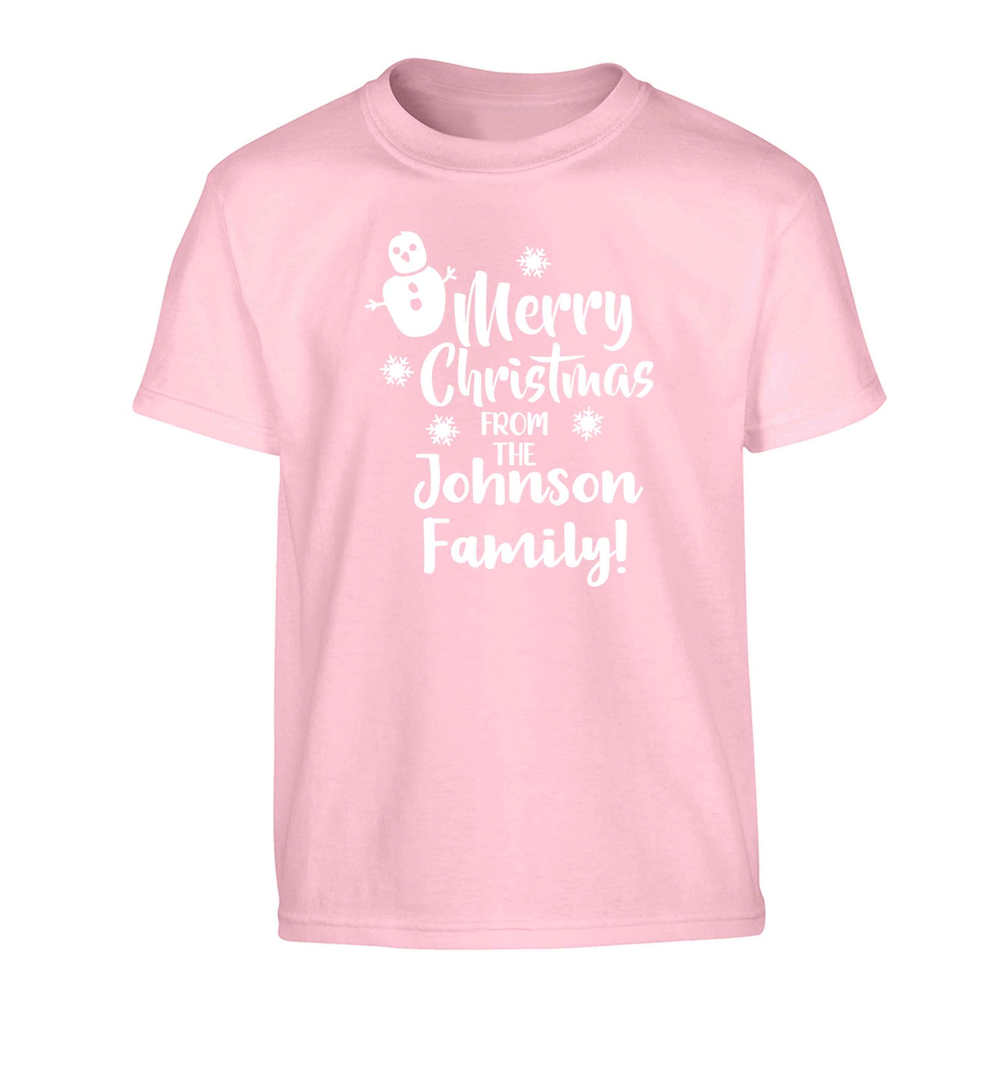 Personalised Merry Christmas from the family Children's light pink Tshirt 12-13 Years
