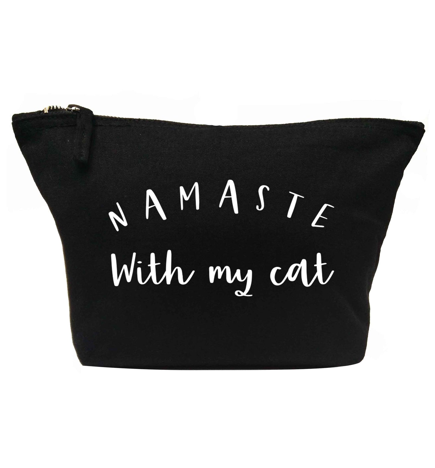 Namaste with my cat | makeup / wash bag