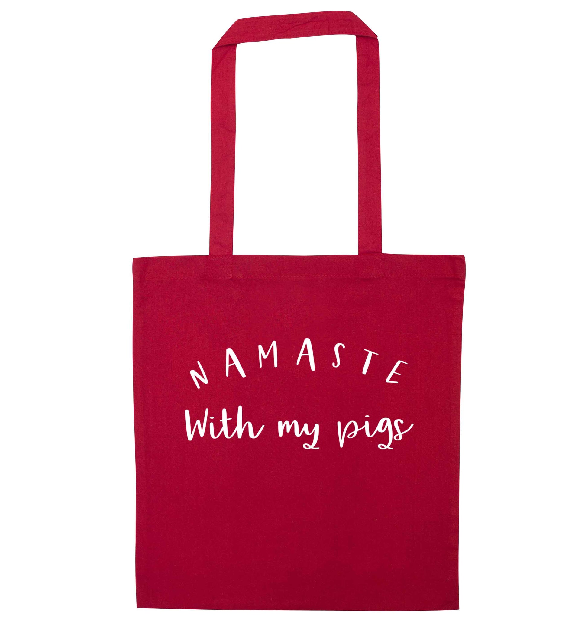 Namaste with my pigs red tote bag