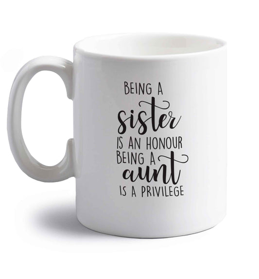 Being a sister is an honour being an auntie is a privilege right handed white ceramic mug 