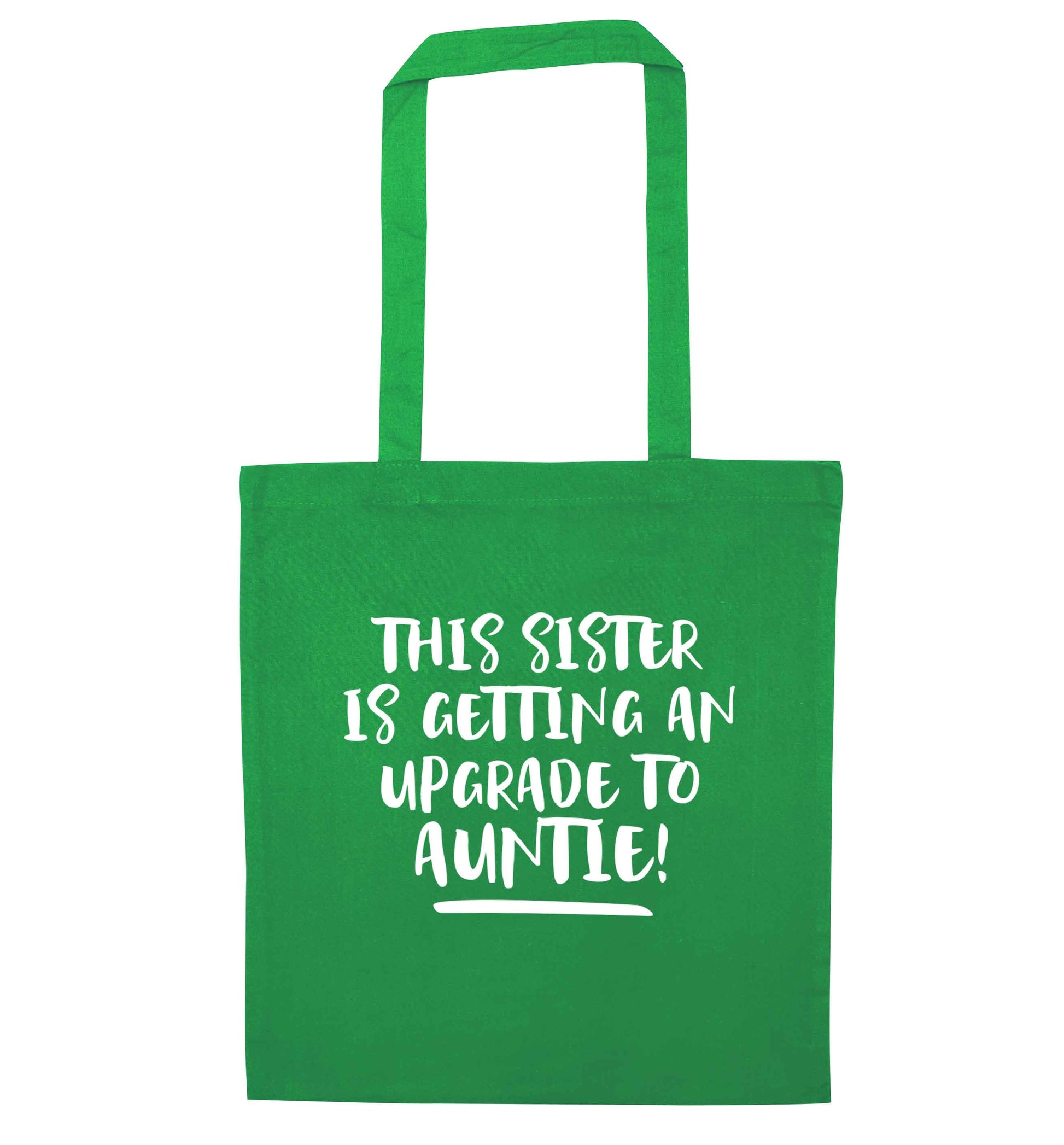 This sister is getting an upgrade to auntie! green tote bag