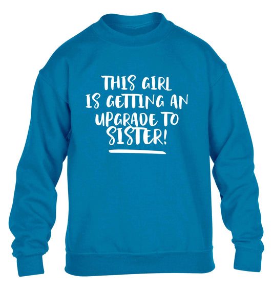 This girl is getting an upgrade to sister! children's blue sweater 12-13 Years