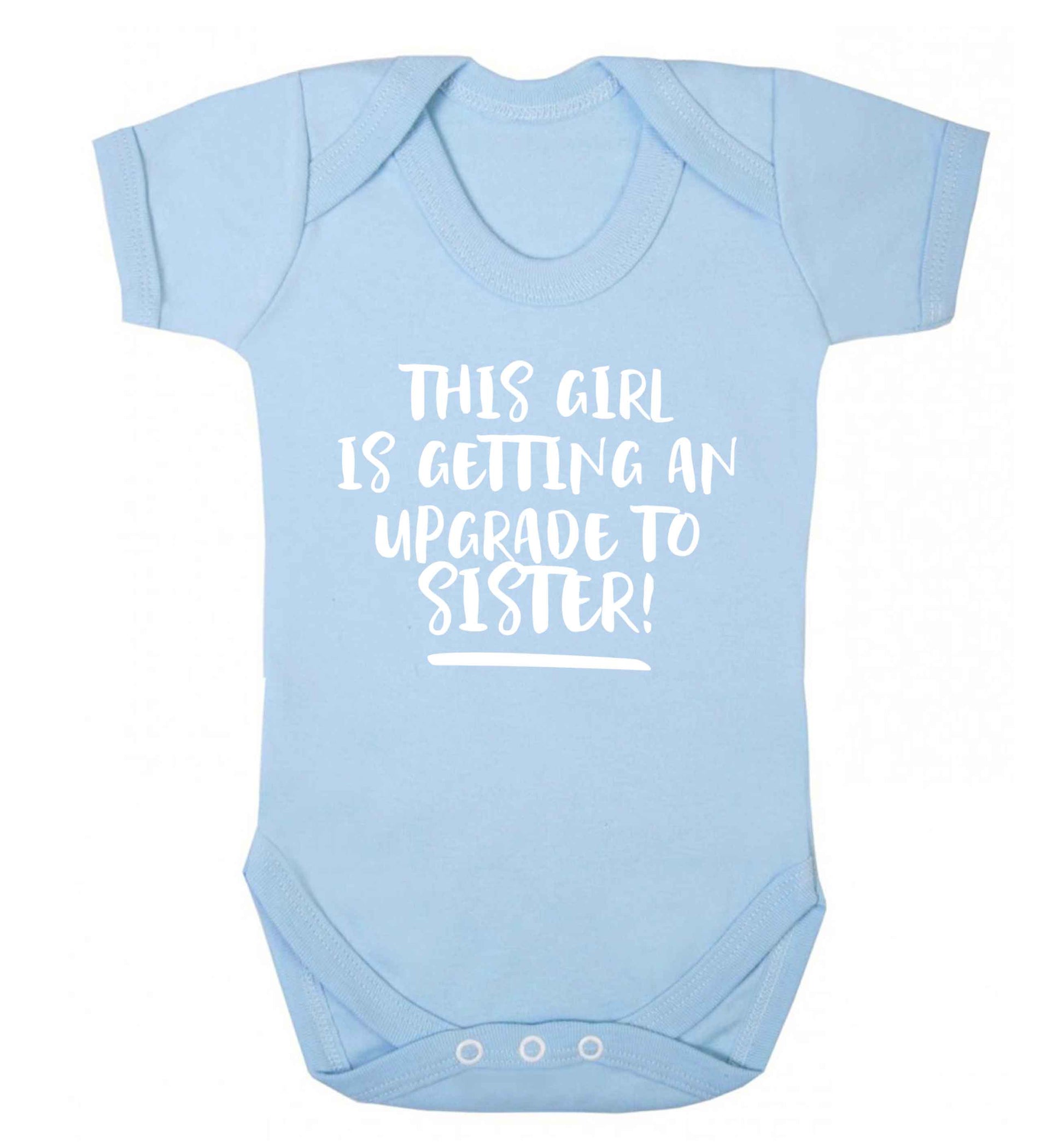 This girl is getting an upgrade to sister! Baby Vest pale blue 18-24 months