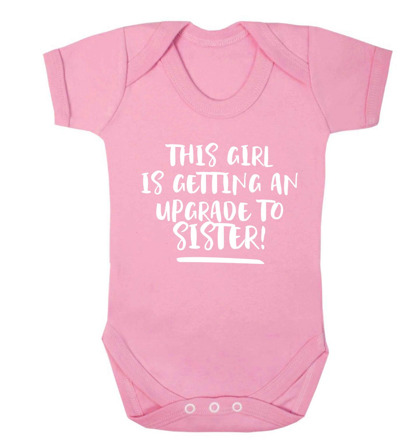 This girl is getting an upgrade to sister! Baby Vest pale pink 18-24 months