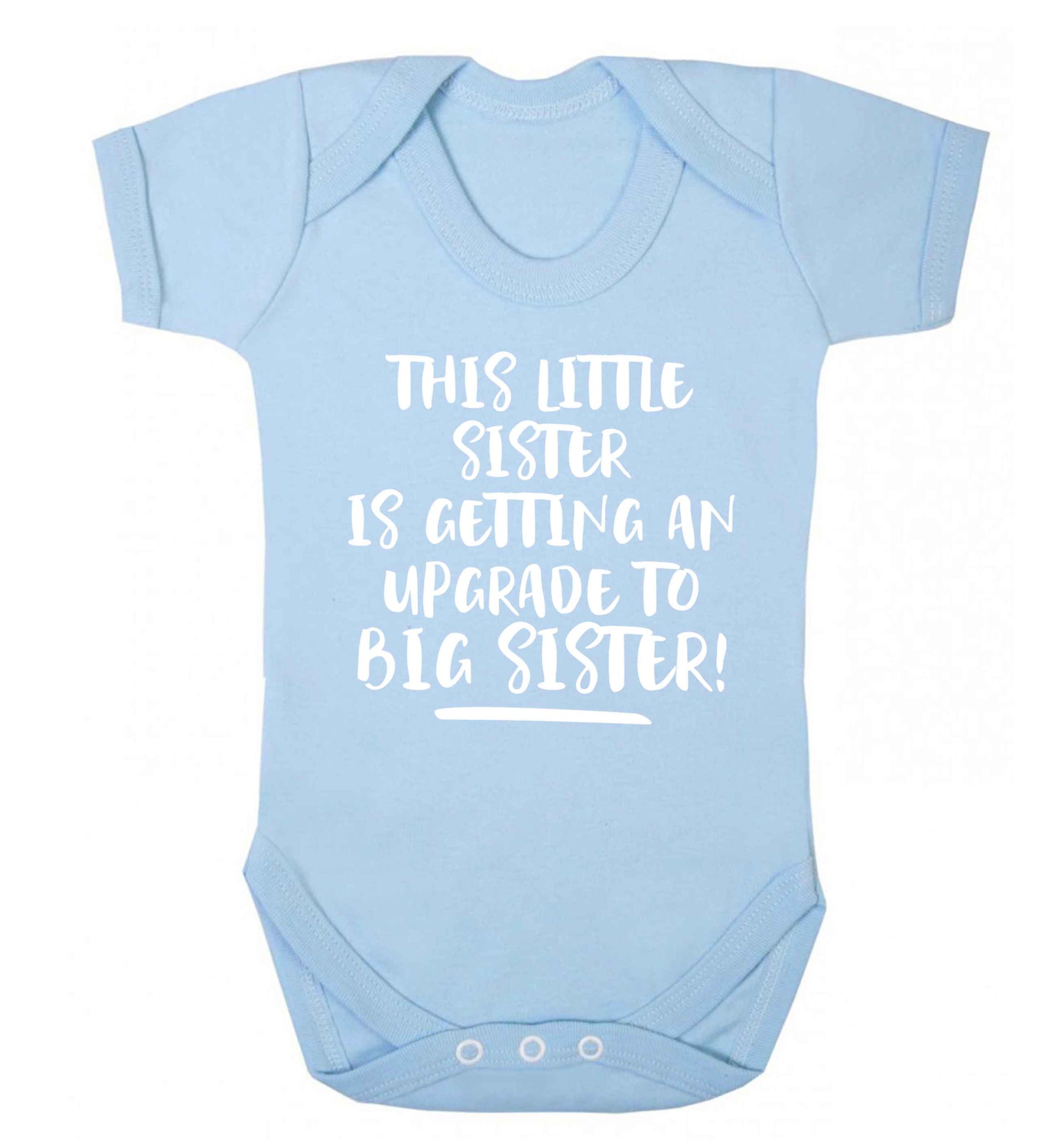 This little sister is getting an upgrade to big sister! Baby Vest pale blue 18-24 months