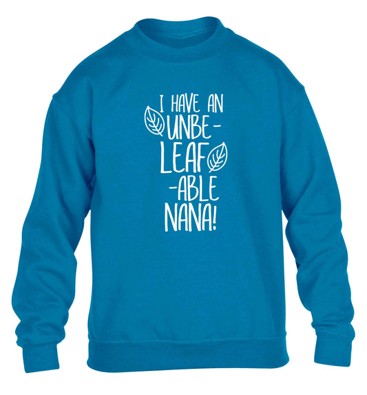 I have an unbe-leaf-able nana children's blue sweater 12-13 Years
