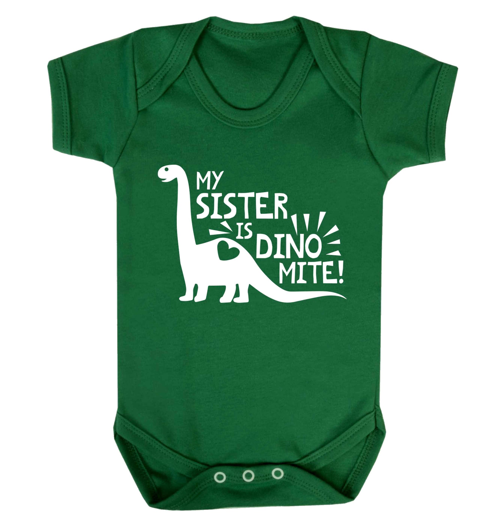 My sister is dinomite! Baby Vest green 18-24 months