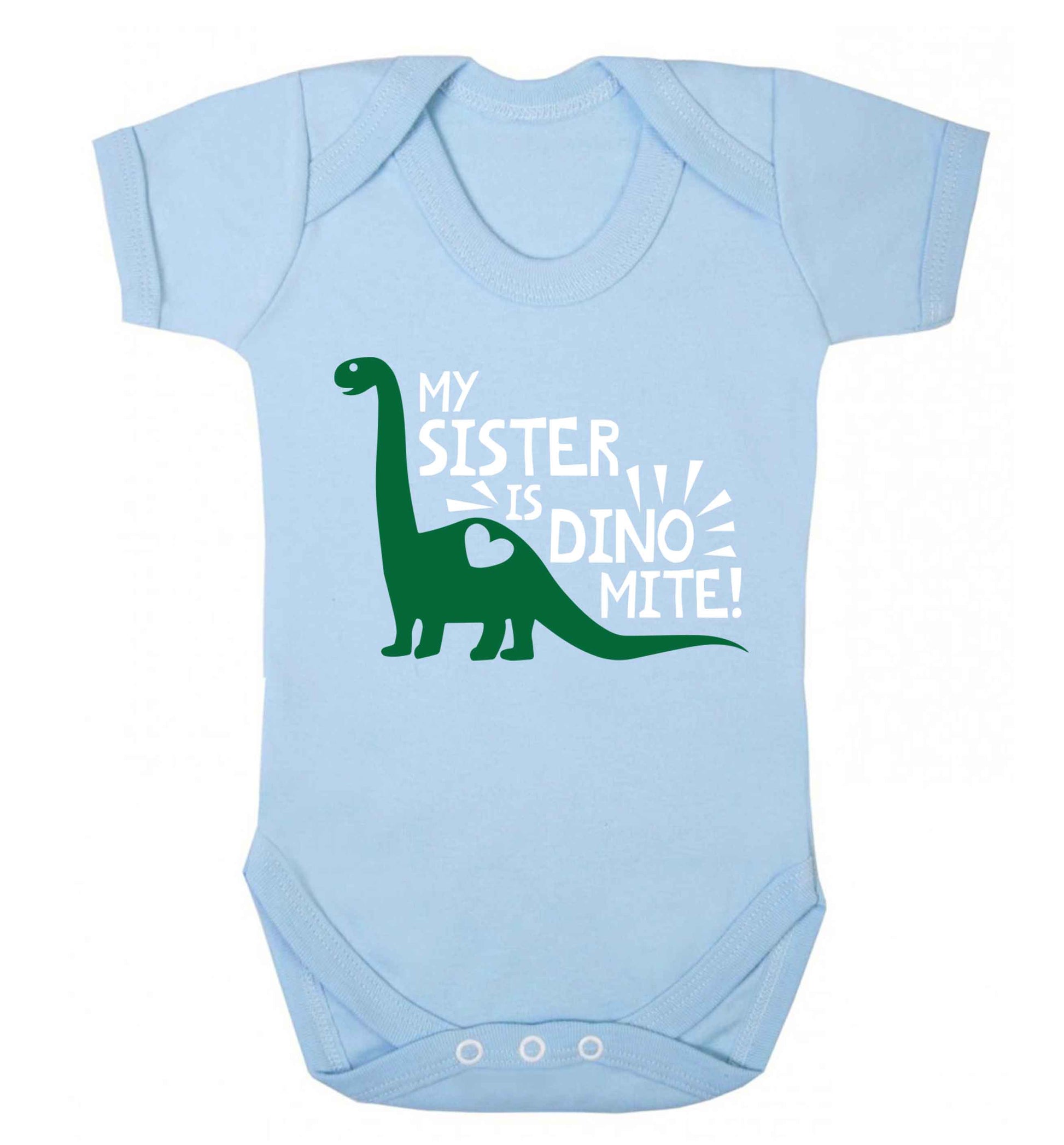 My sister is dinomite! Baby Vest pale blue 18-24 months