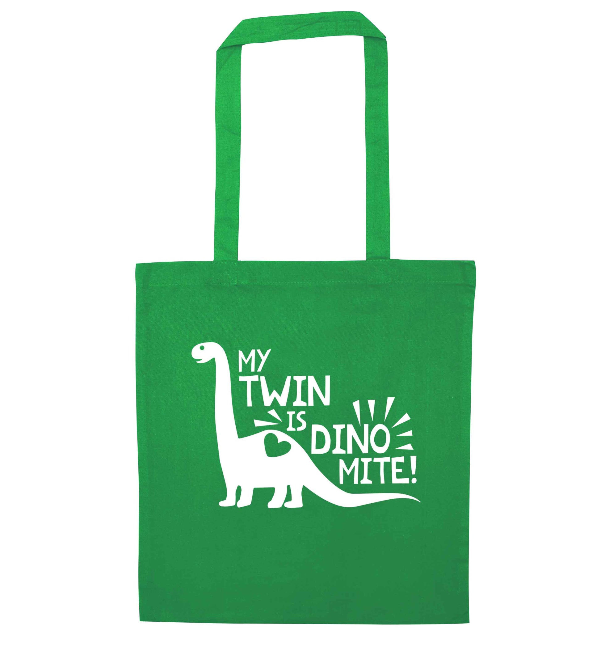 My twin is dinomite! green tote bag