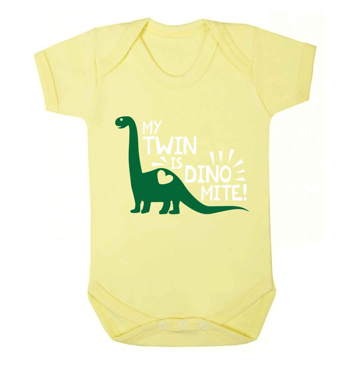My twin is dinomite! Baby Vest pale yellow 18-24 months