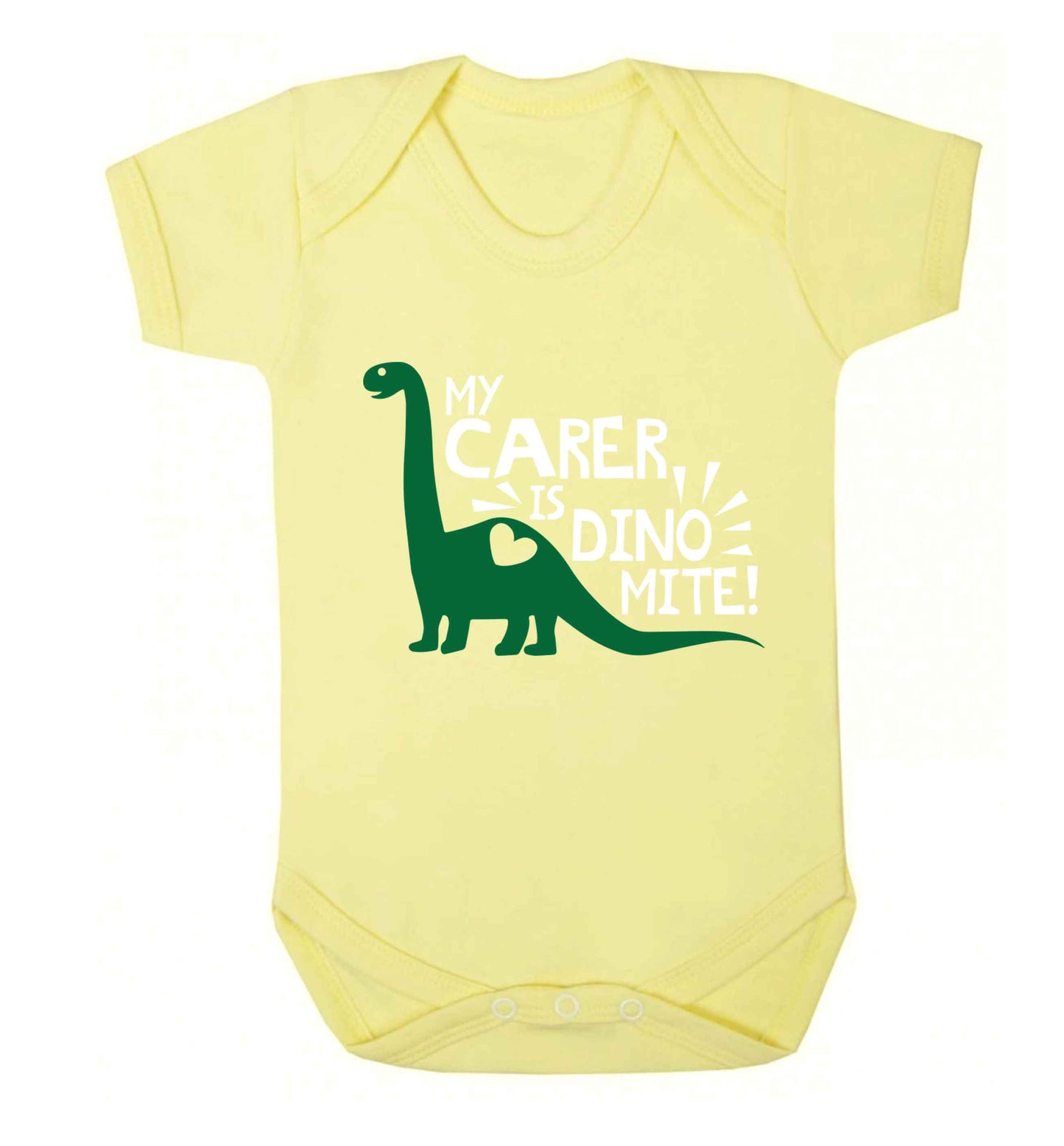 My carer is dinomite! Baby Vest pale yellow 18-24 months