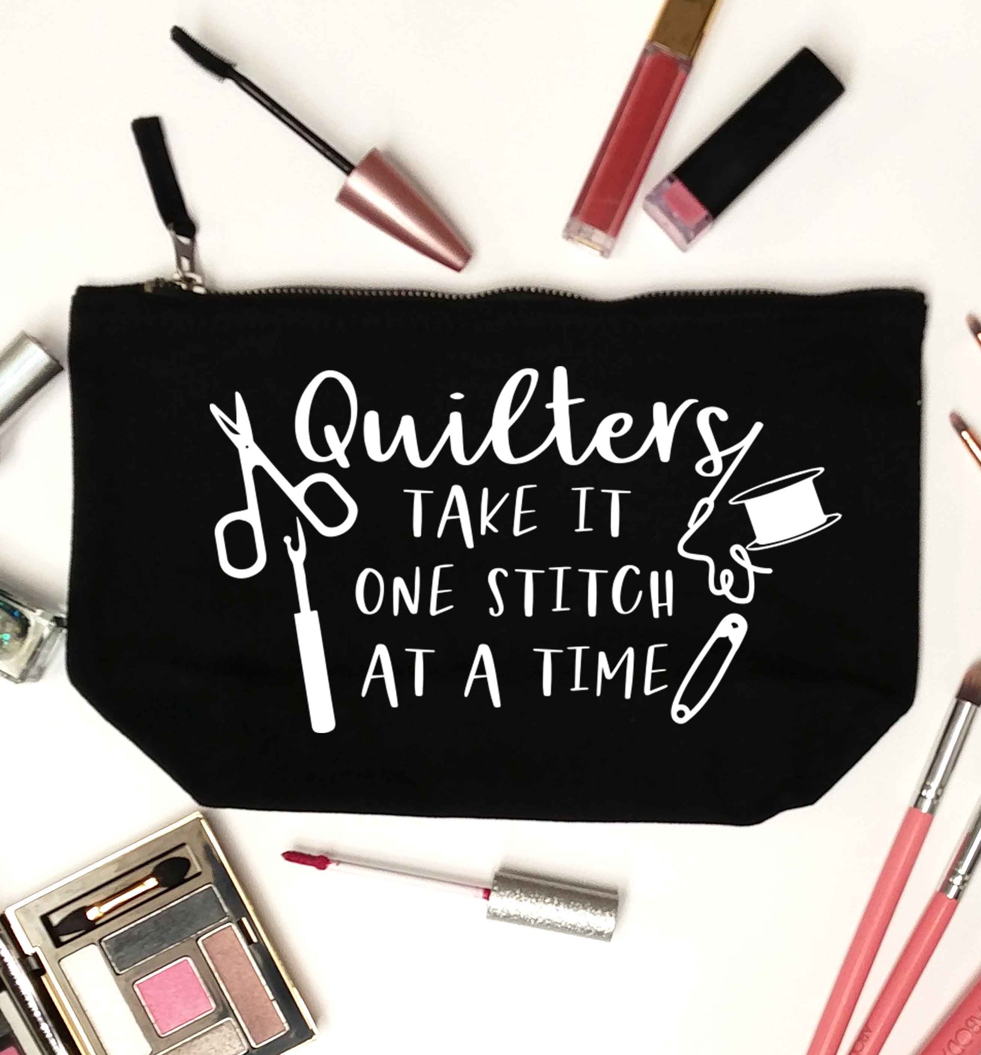 Quilters take it one stitch at a time  black makeup bag
