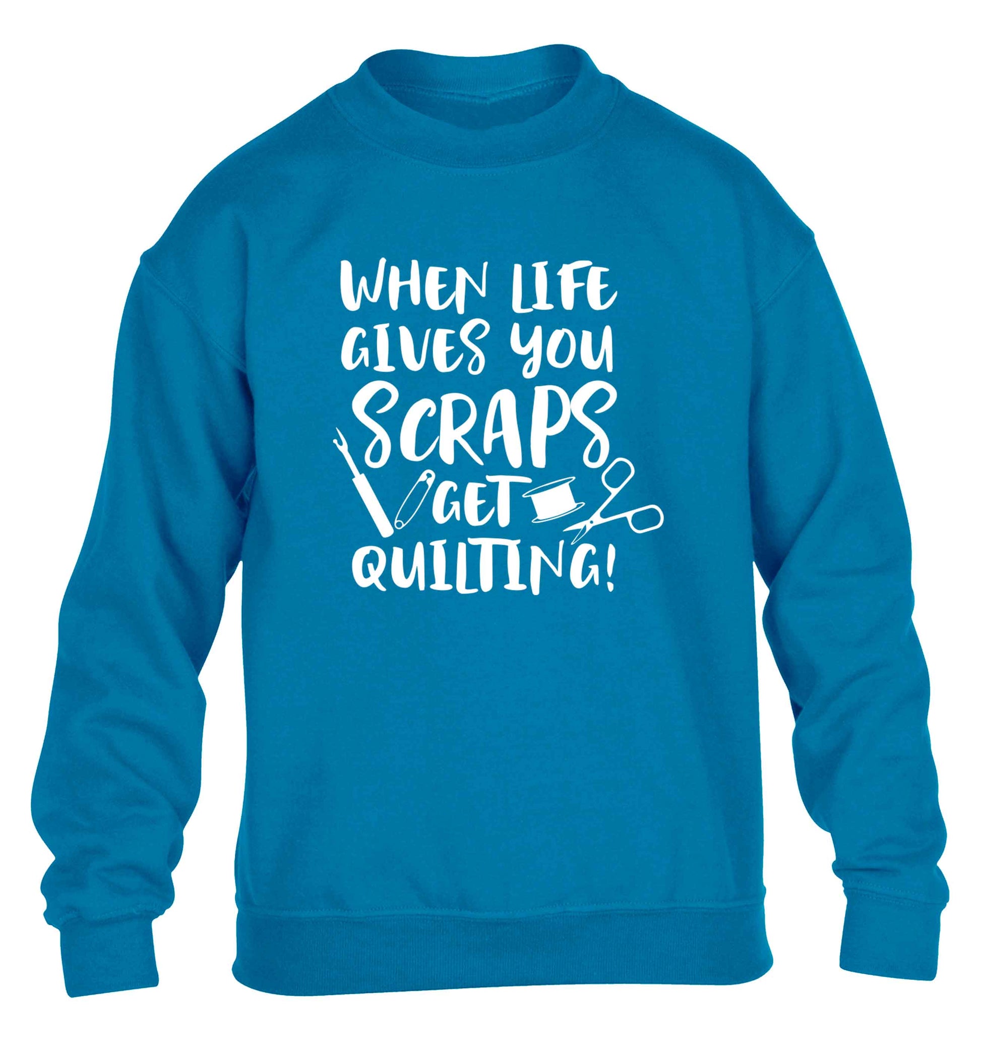 When life gives you scraps get quilting! children's blue sweater 12-13 Years