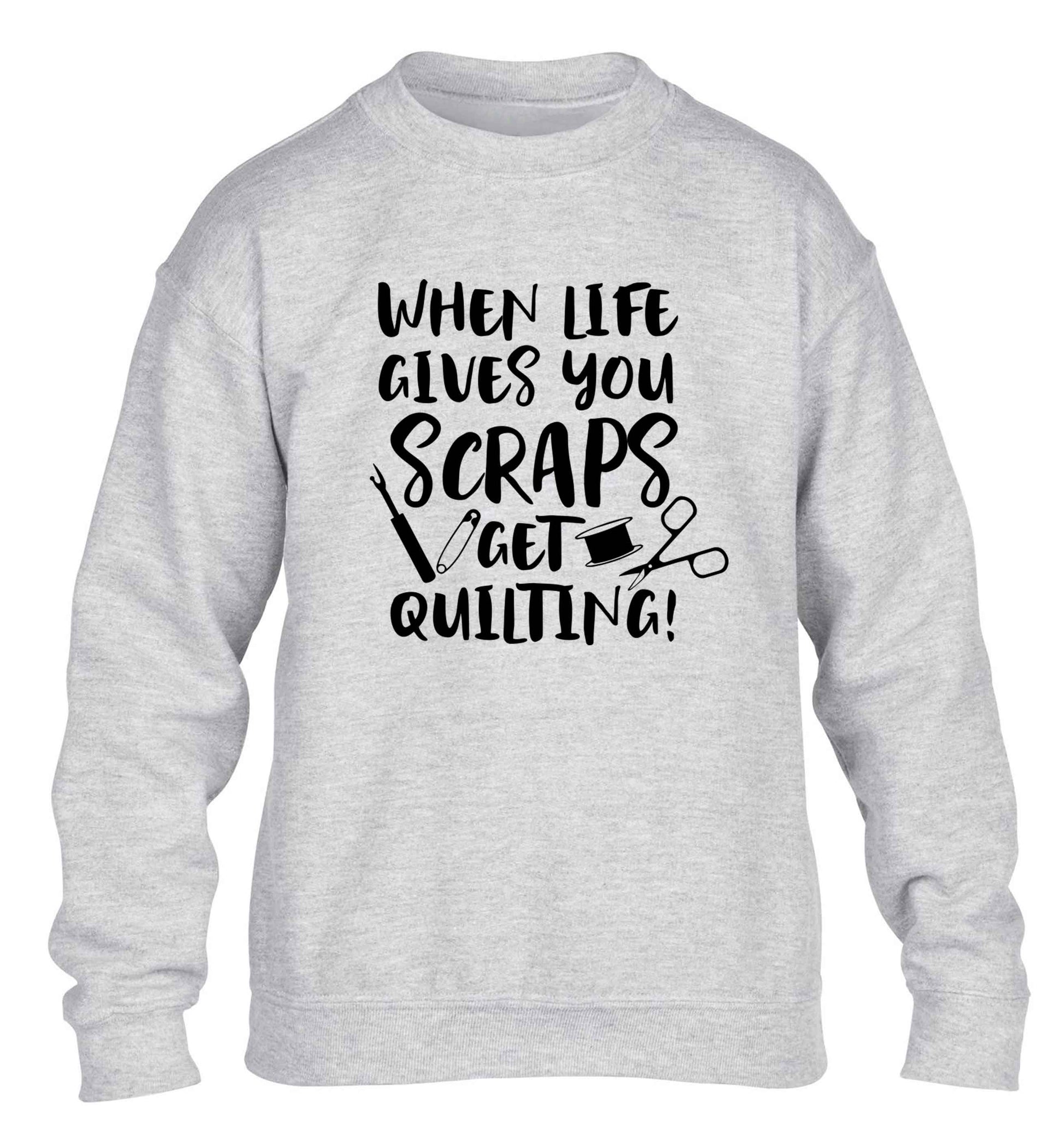 When life gives you scraps get quilting! children's grey sweater 12-13 Years
