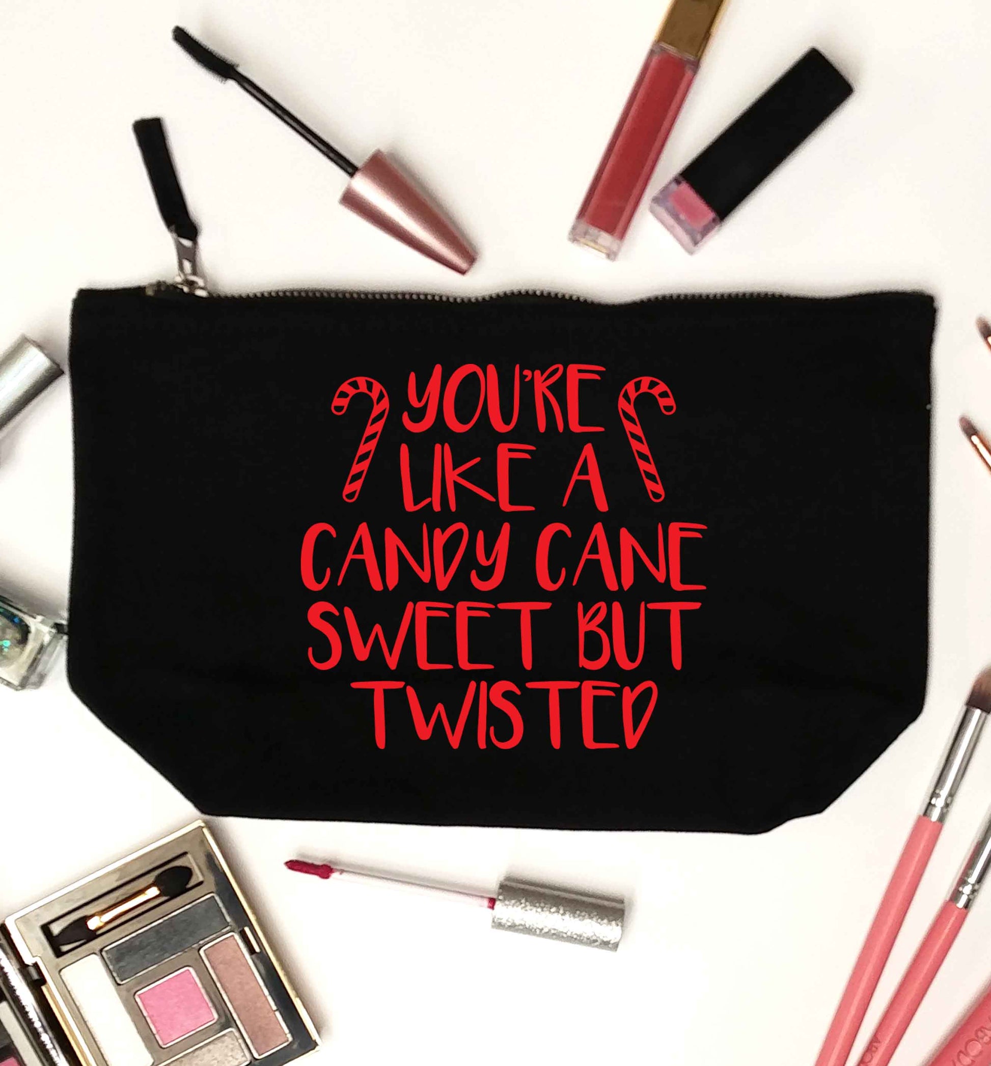You're like a candy cane sweet but twisted black makeup bag