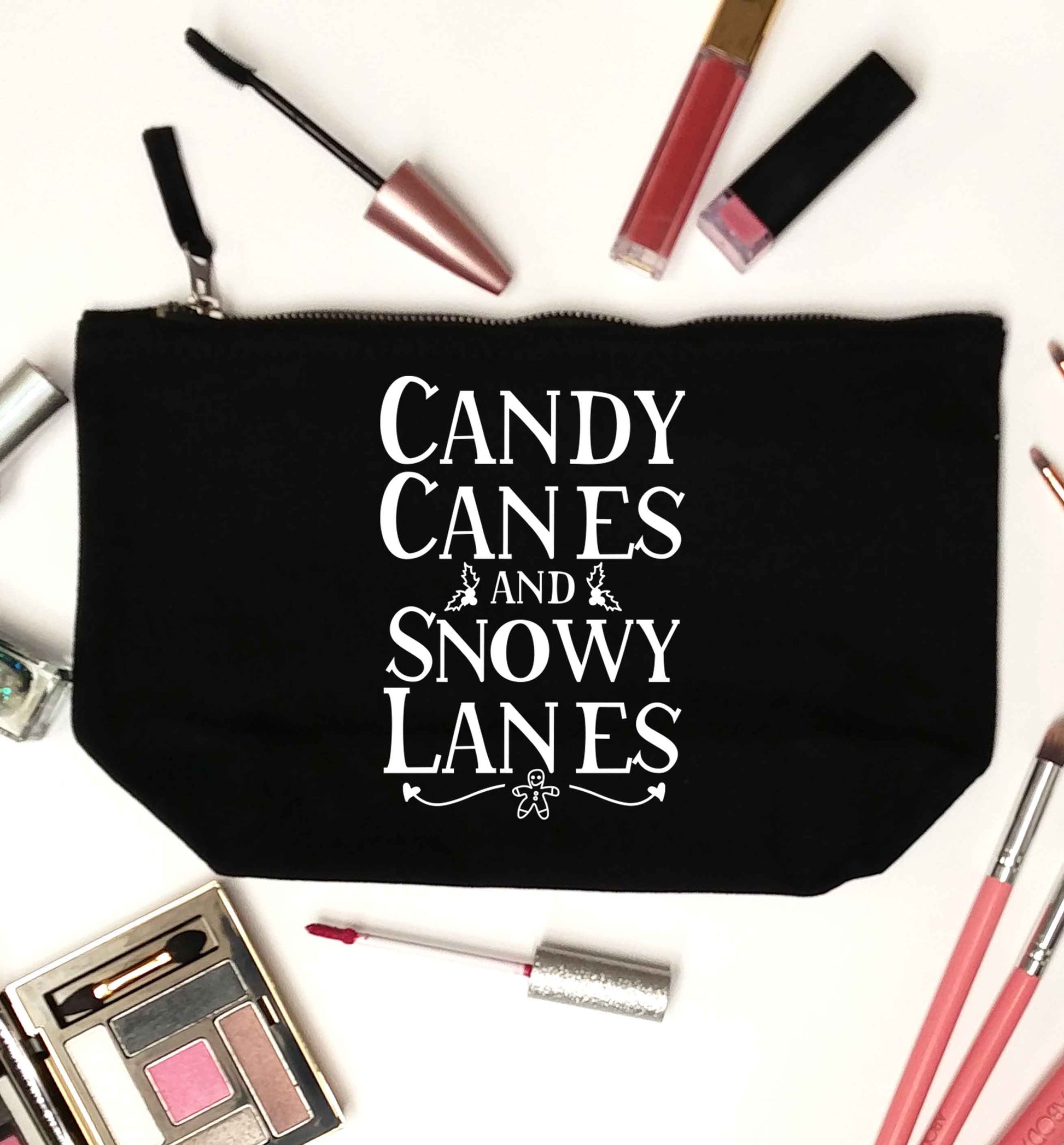 Candy canes and snowy lanes black makeup bag