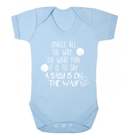 Oh what fun it is to say a baby is on the way! Baby Vest pale blue 18-24 months