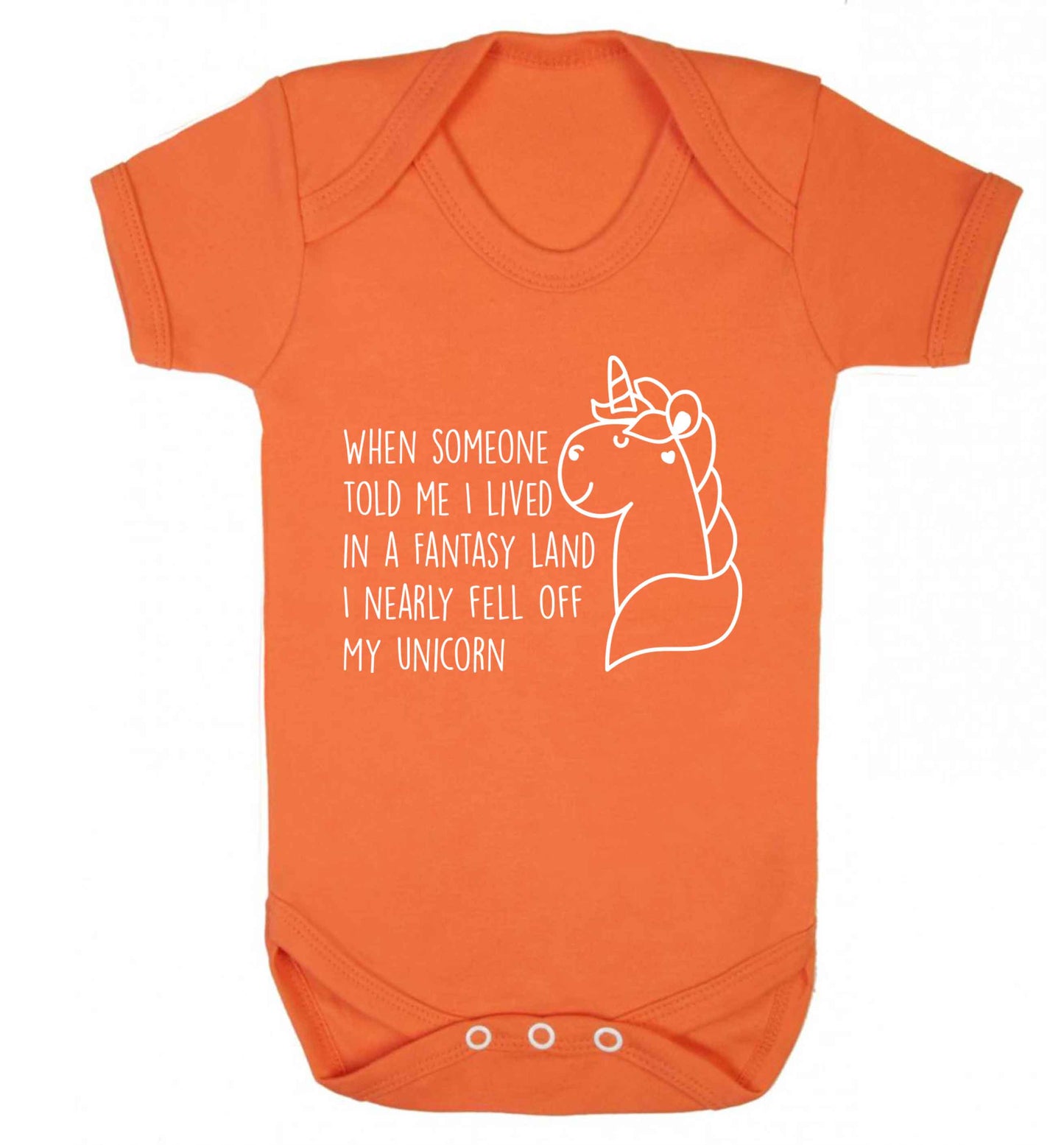 When somebody told me I lived in a fantasy land I nearly fell of my unicorn Baby Vest orange 18-24 months