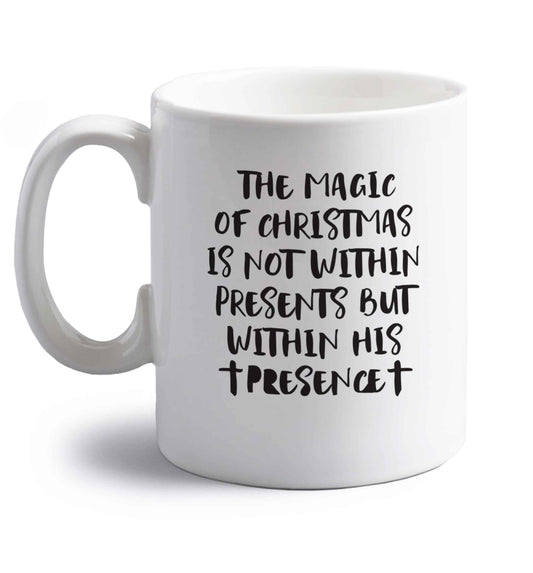 The magic of Christmas is not within presents but within his presence right handed white ceramic mug 