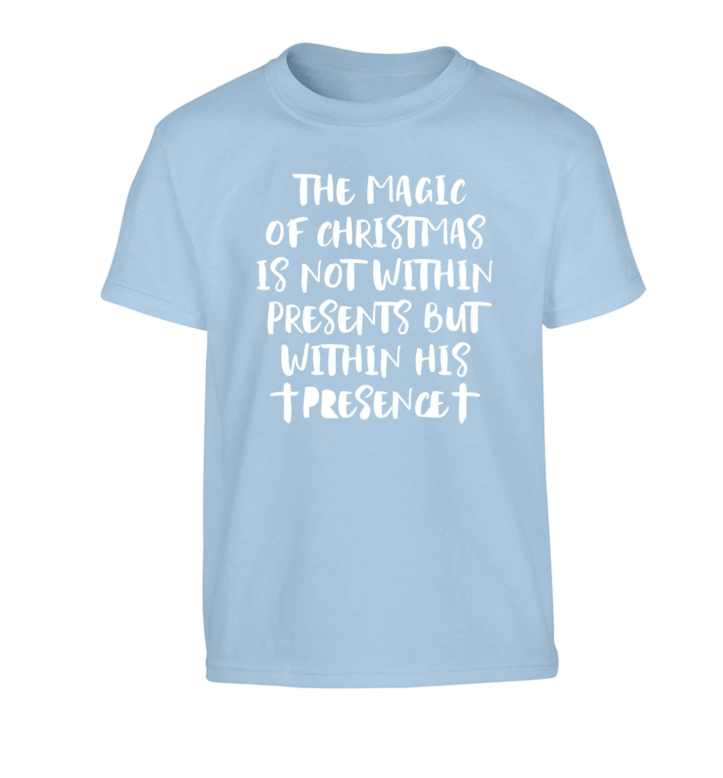 The magic of Christmas is not within presents but within his presence Children's light blue Tshirt 12-13 Years