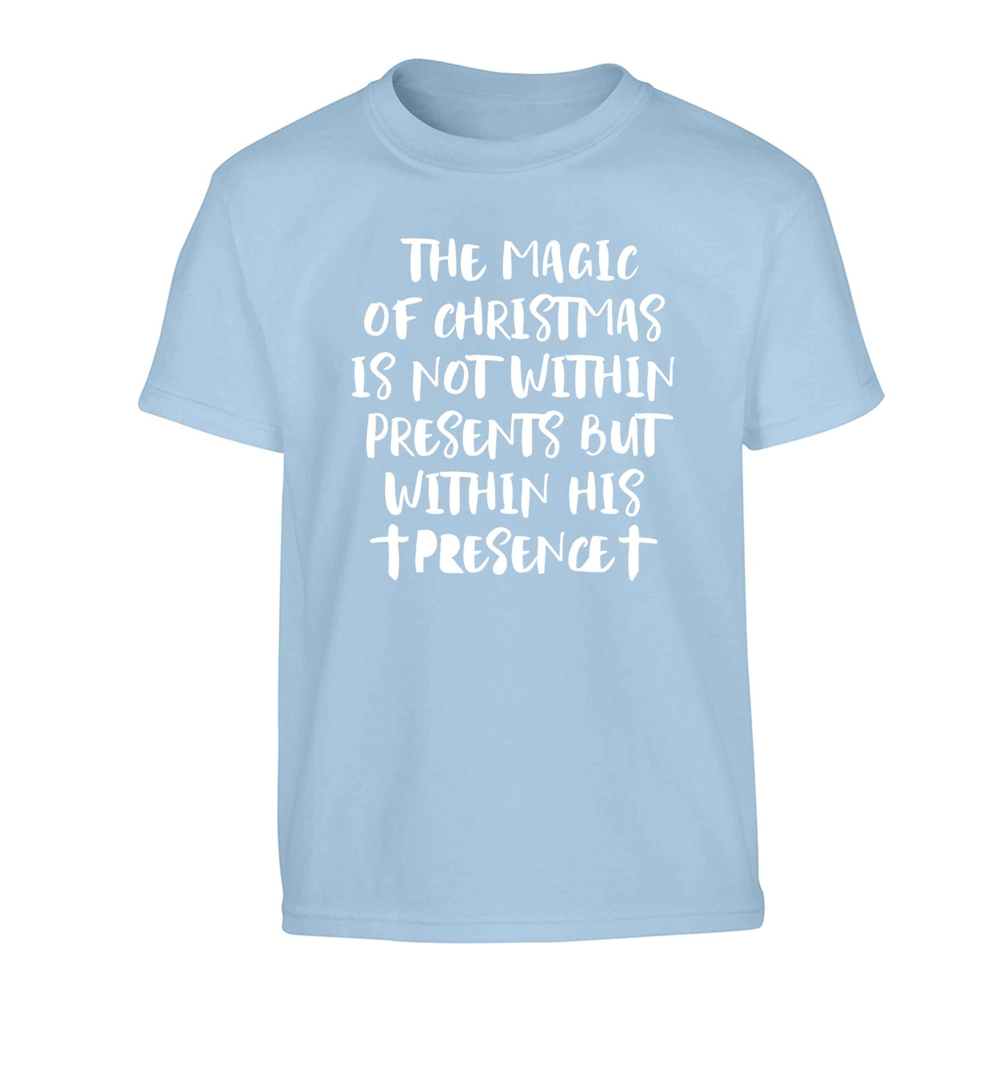The magic of Christmas is not within presents but within his presence Children's light blue Tshirt 12-13 Years