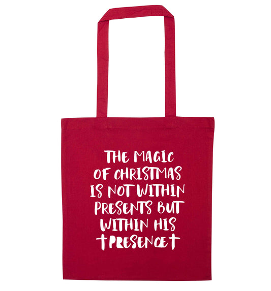 The magic of Christmas is not within presents but within his presence red tote bag