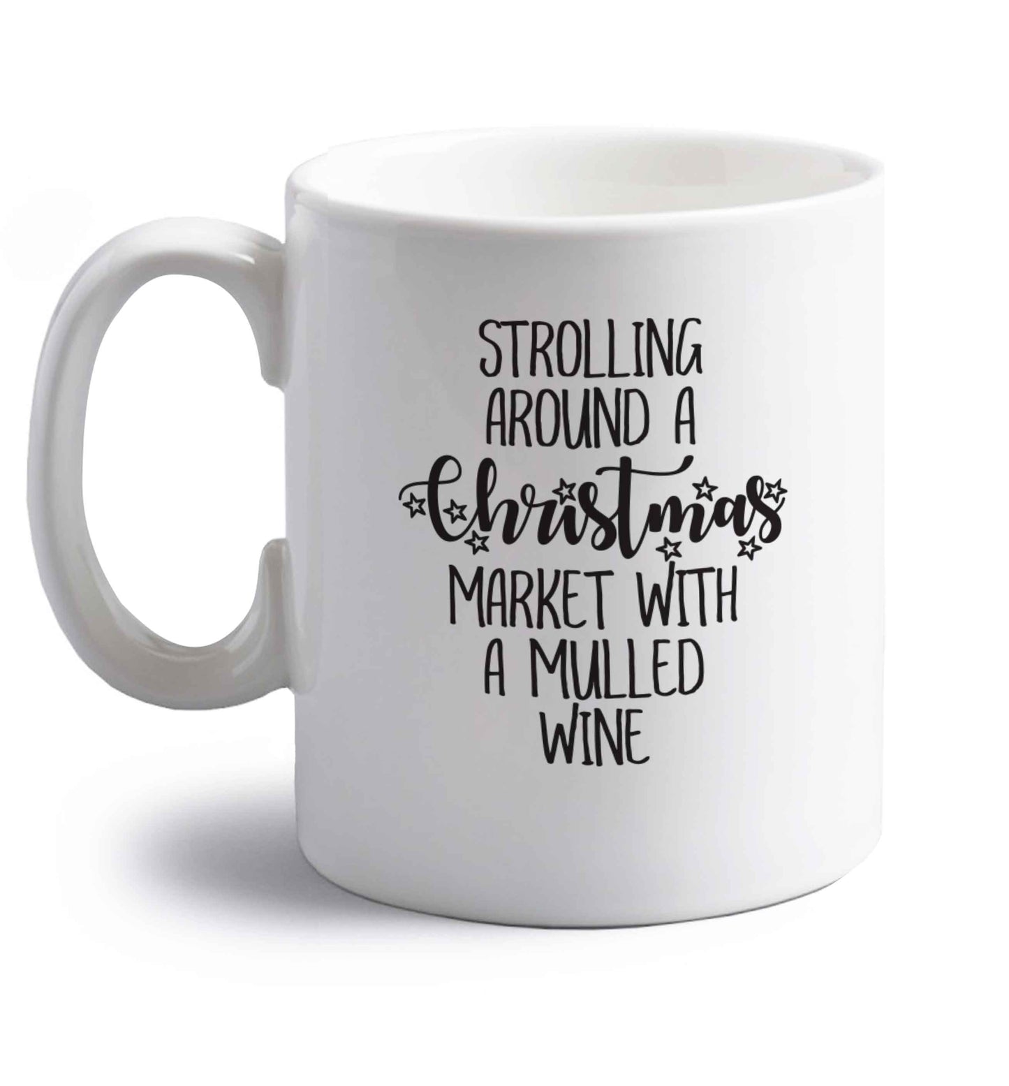 Strolling around a Christmas market with mulled wine right handed white ceramic mug 