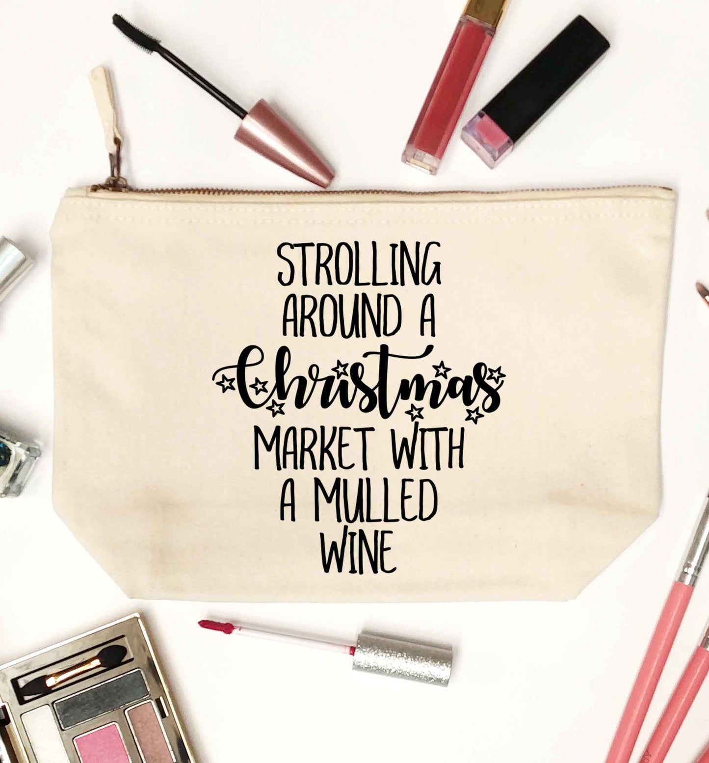 Strolling around a Christmas market with mulled wine natural makeup bag