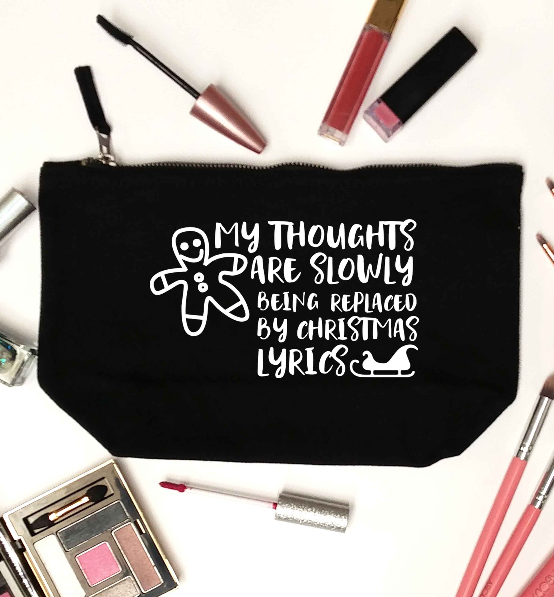 My thoughts are slowly being replaced by Christmas lyrics black makeup bag