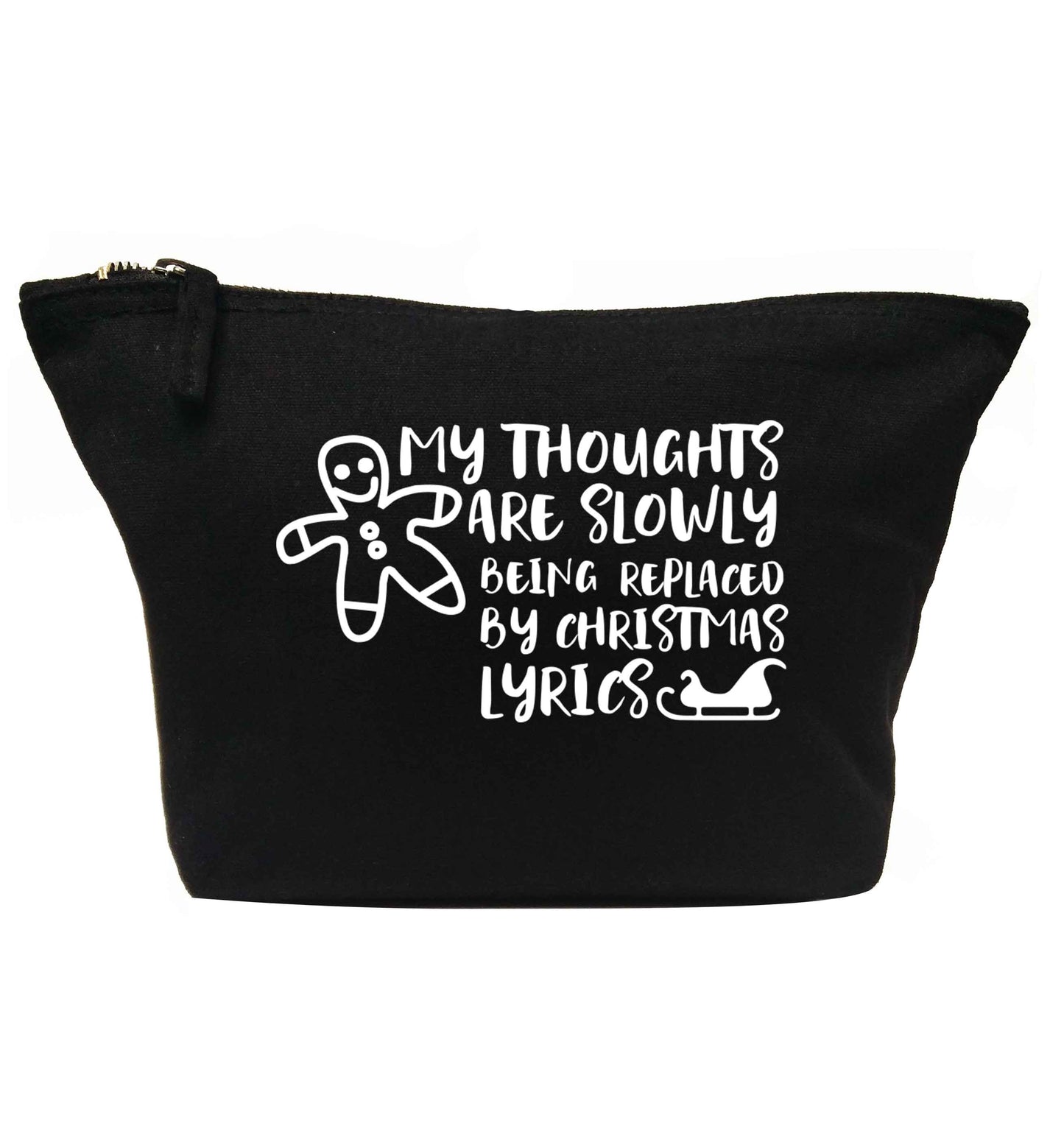 My thoughts are slowly being replaced by Christmas lyrics | makeup / wash bag