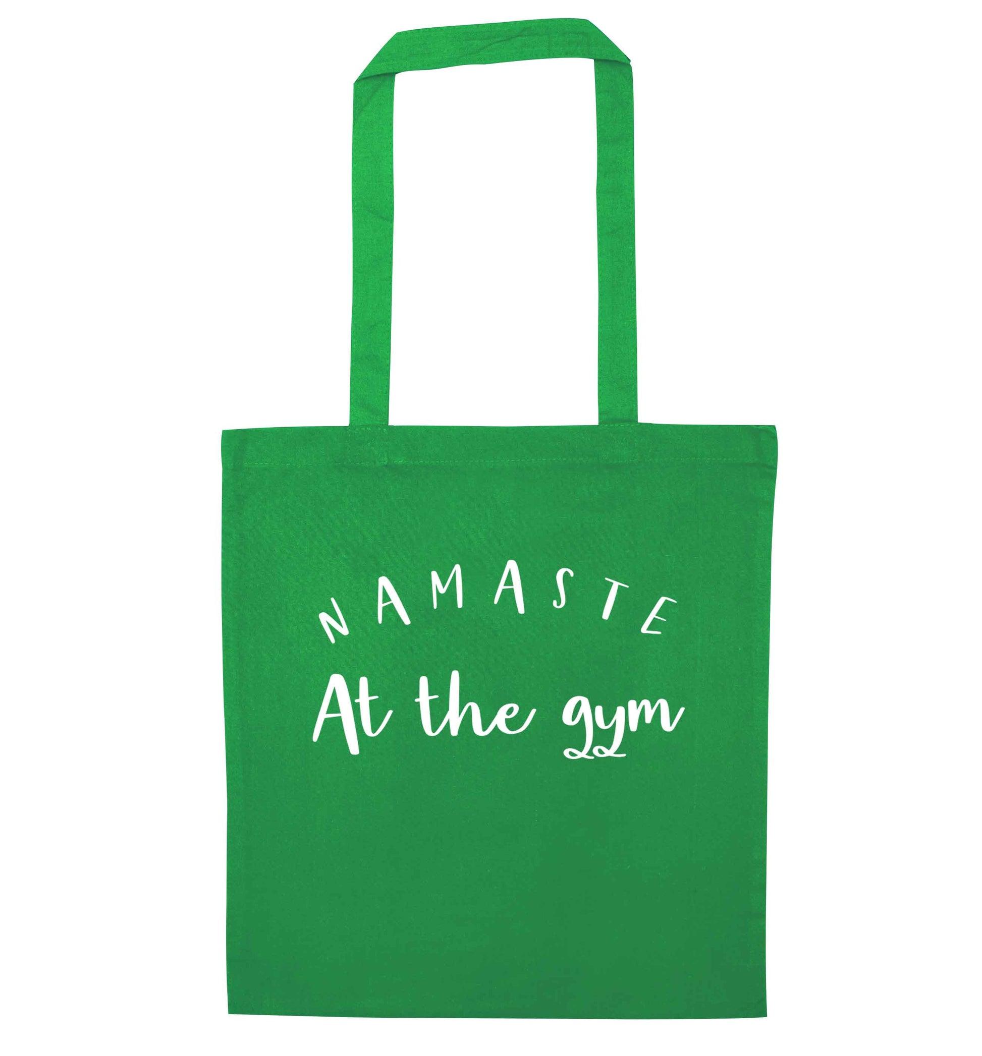 Namaste at the gym green tote bag